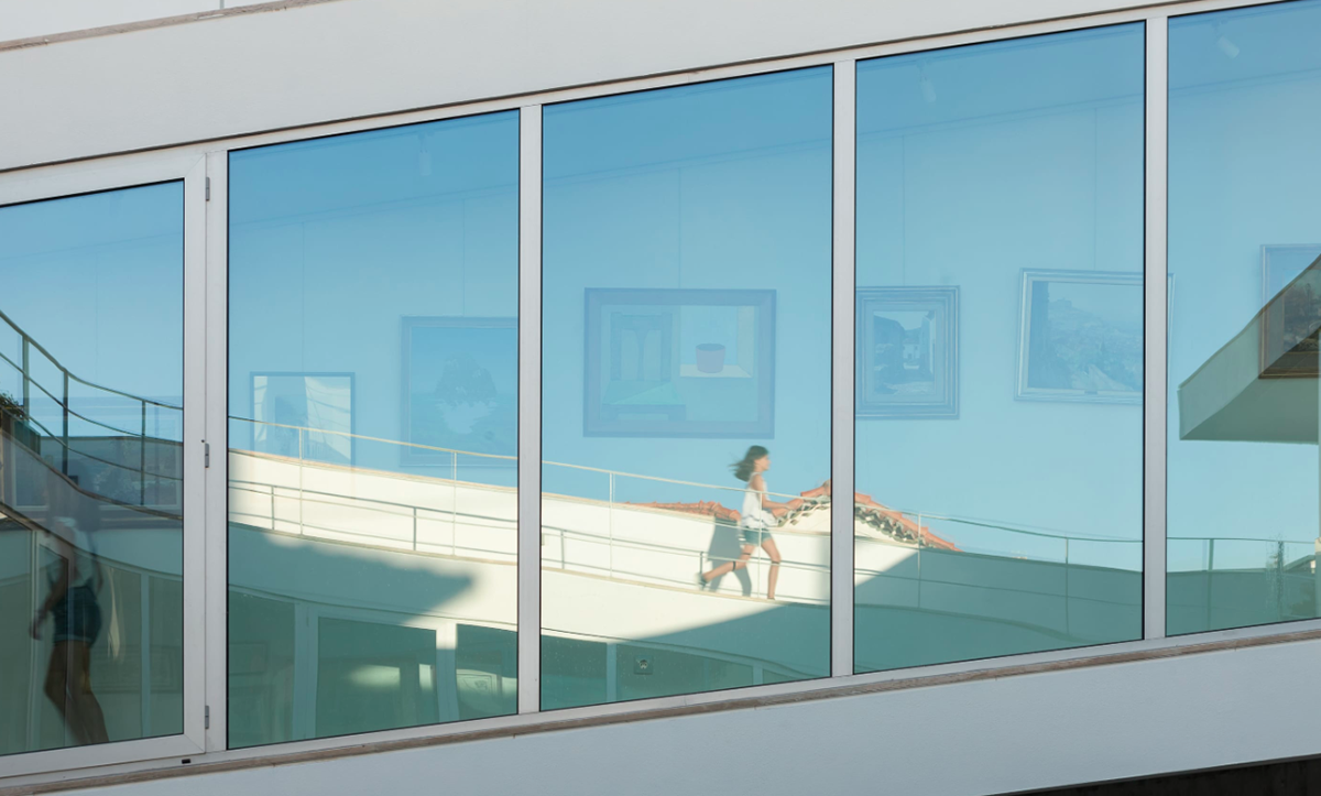 Antonio Costa Lima designs continuous inner gallery in Portugese house to overcome windowless fa&ccedil;ade