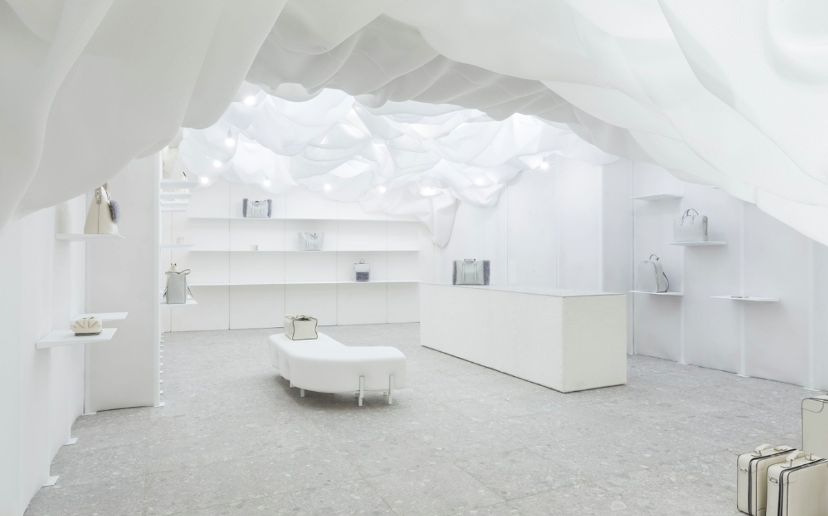 Snarkitecture created pop-up clouded-fabric for Valextra’s store in Milan
