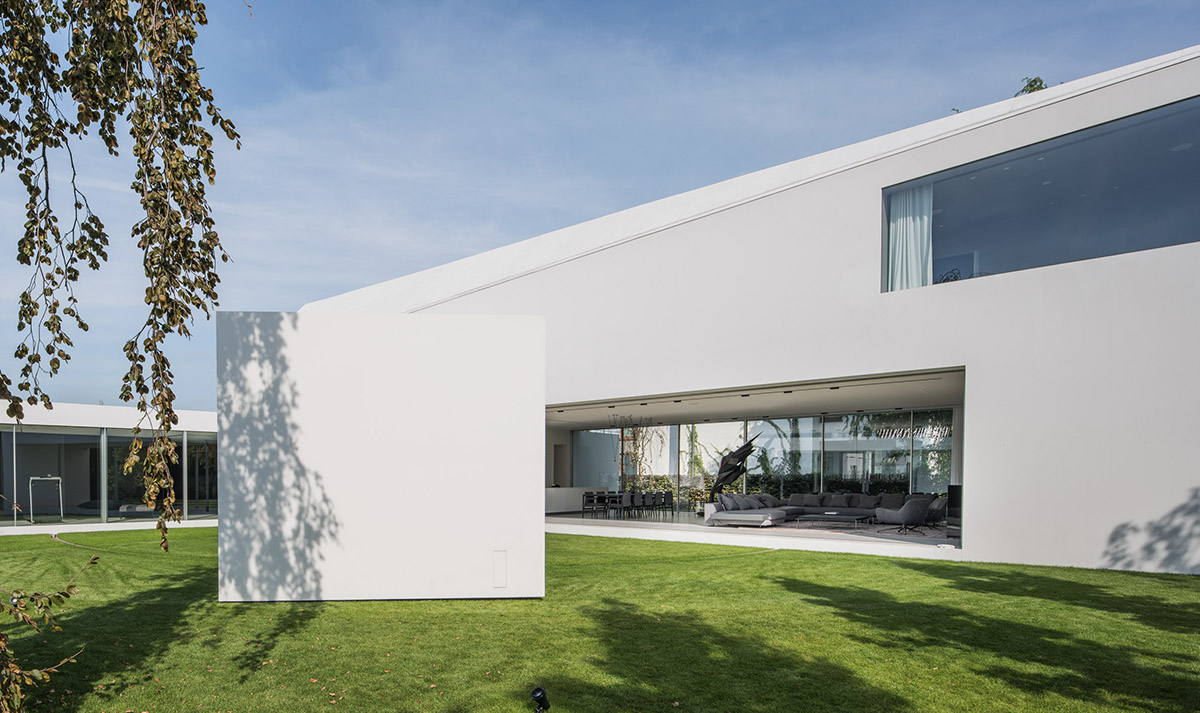 Movements of sun define the form of this protruding house designed by KWK Promes in Poland