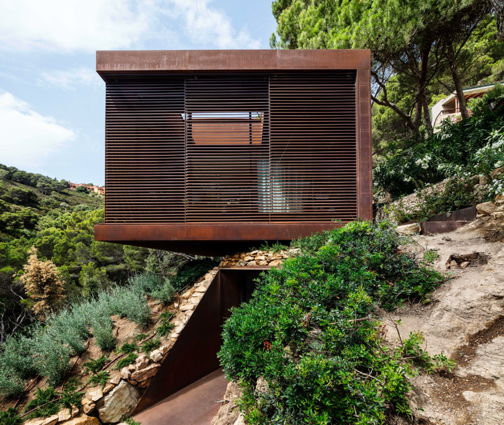 This Is Arquitectura completes corten steel Guest Pavilion in the middle of forest in Spain