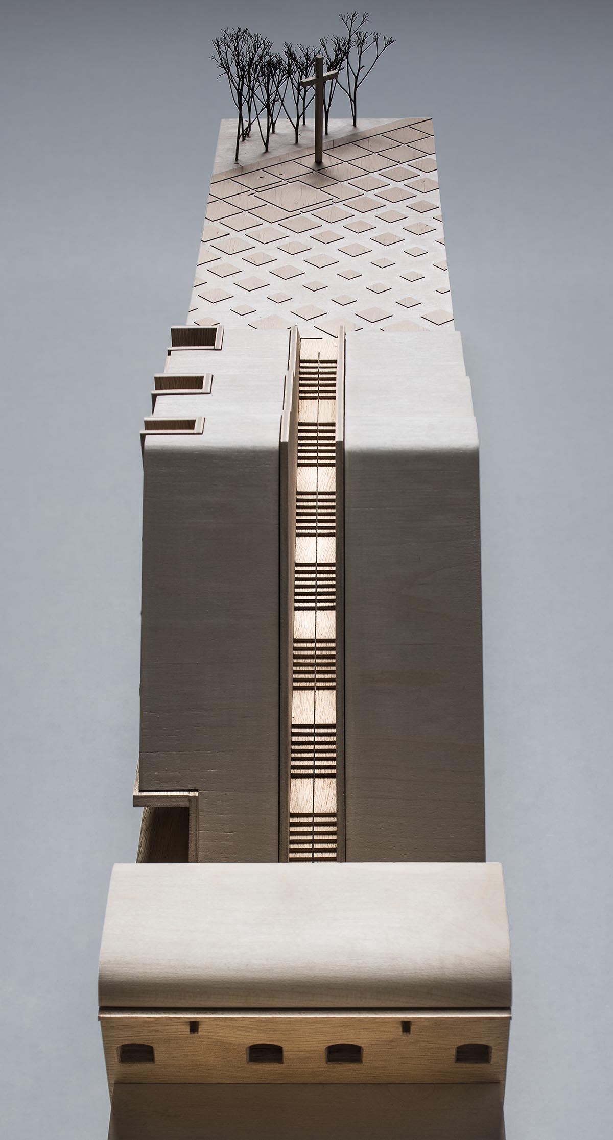 BBGK Architekci designed 12-metre-high stained concrete wall to narrate victims for Katyn Museum