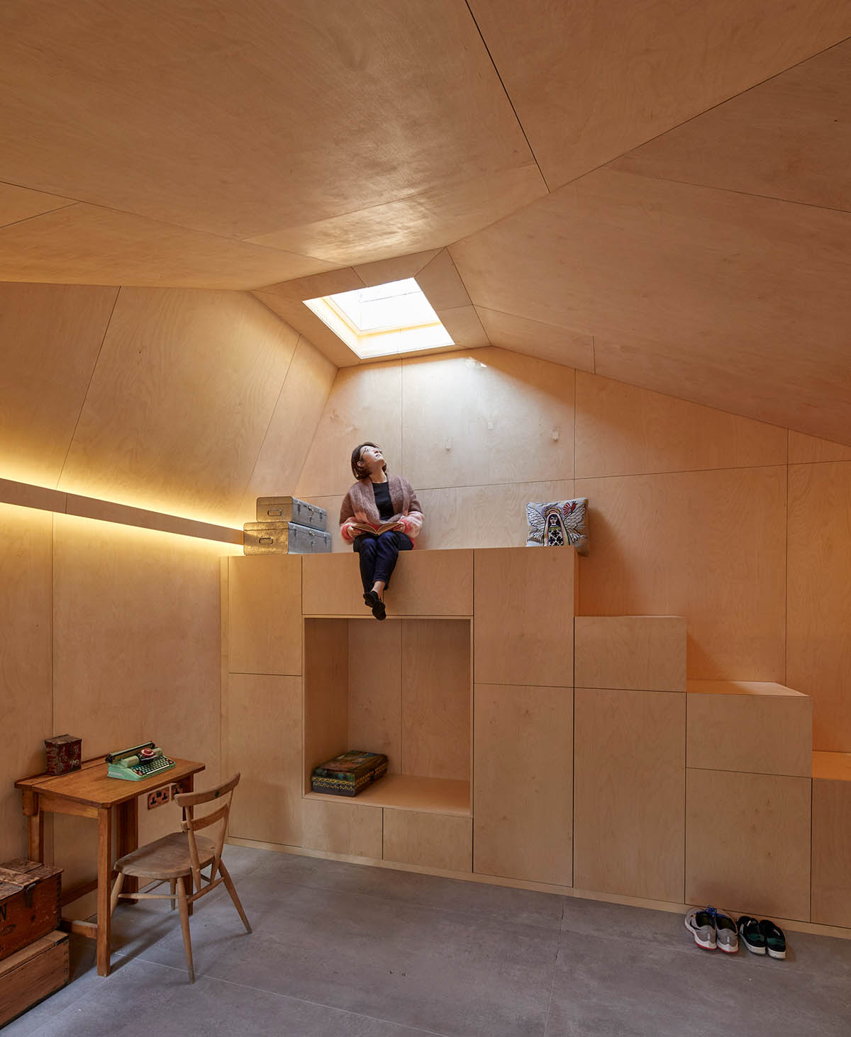 RISE Design Studio built sunken garden studio with rusted steel to provide a hidden place to escape