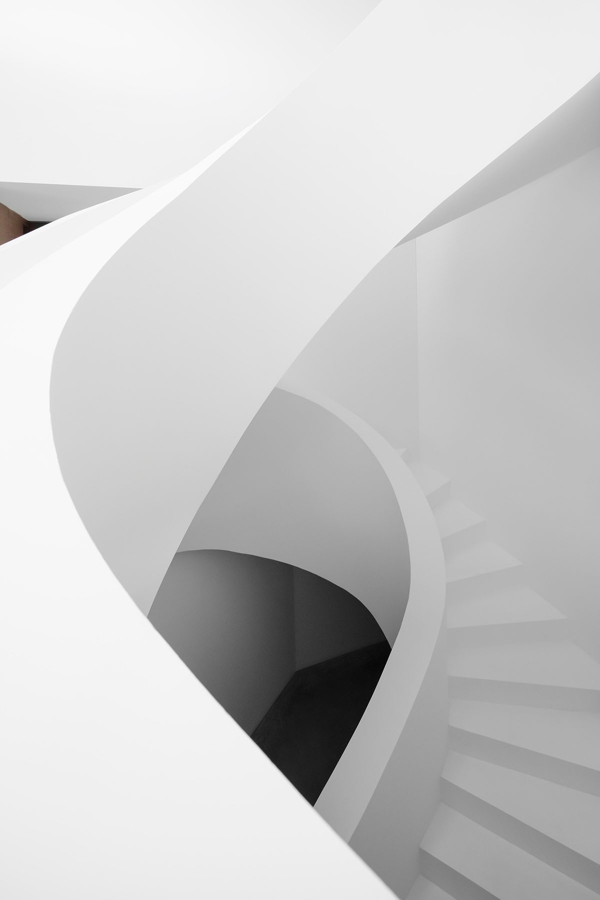 Grey concrete villa by DF_DC is characterised with trapezoidal colonnaded terrace on Comano hills