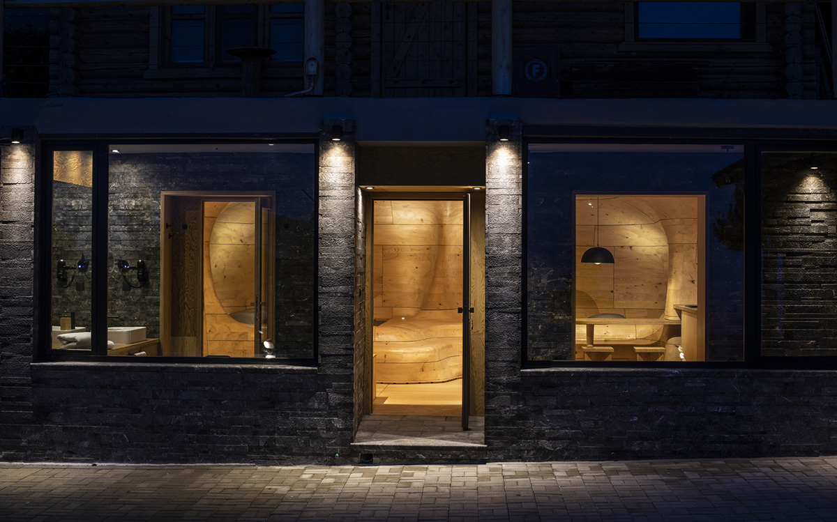 Tenon Architecture creates cave-like wooden interior for a resort in Greece