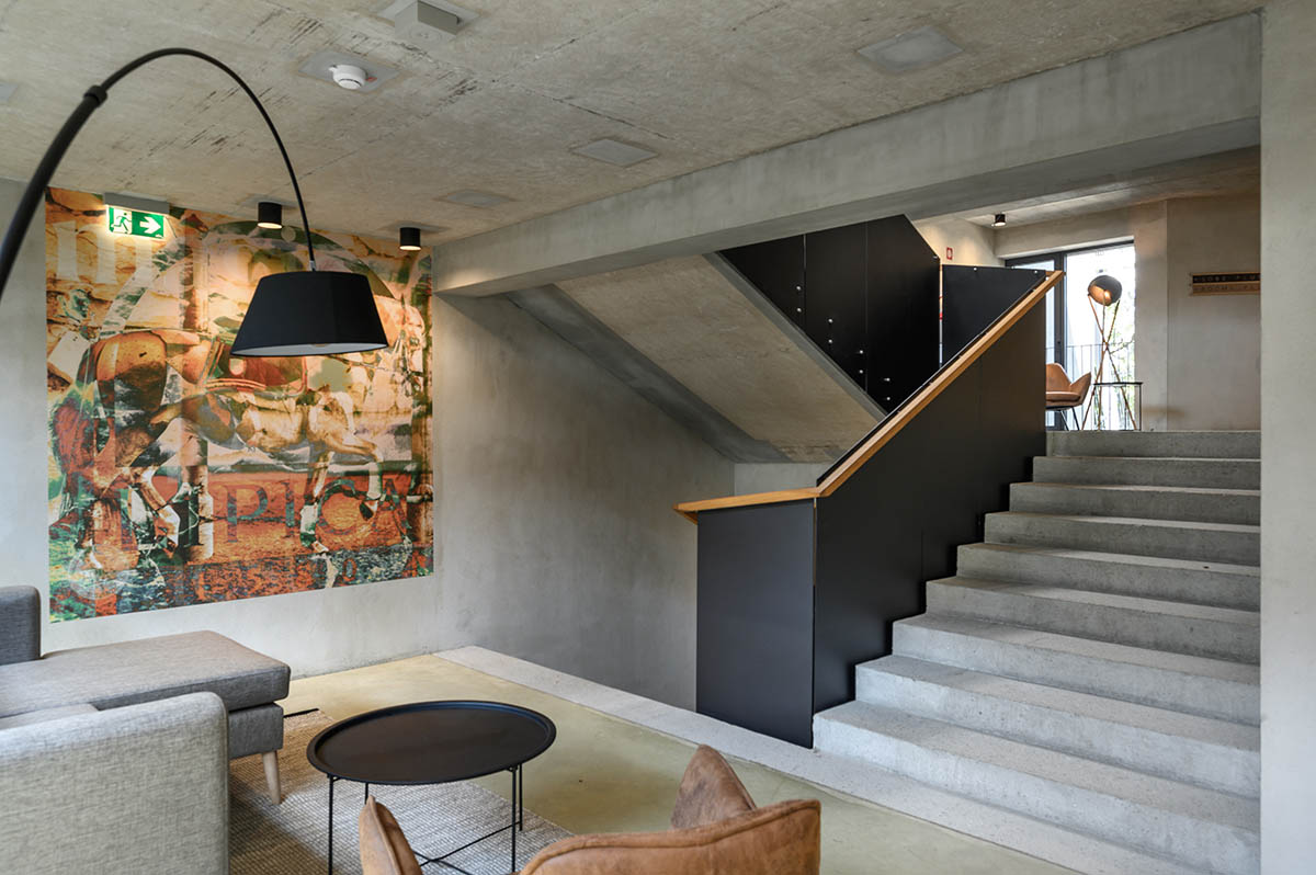 Enota designs hotel with aggressive façade made of white fences in Slovenia