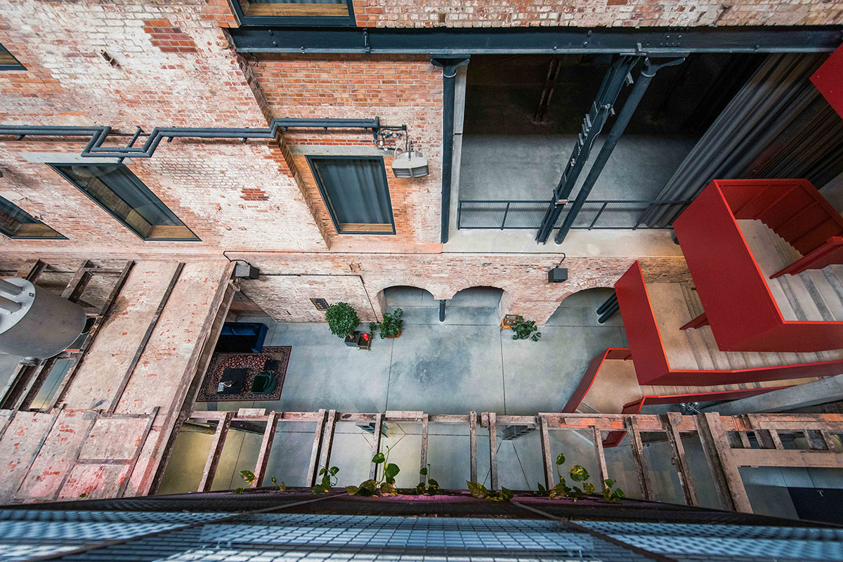 Bulak Projekt transforms former sugar factory into hotel complex with industrial look in Poland  