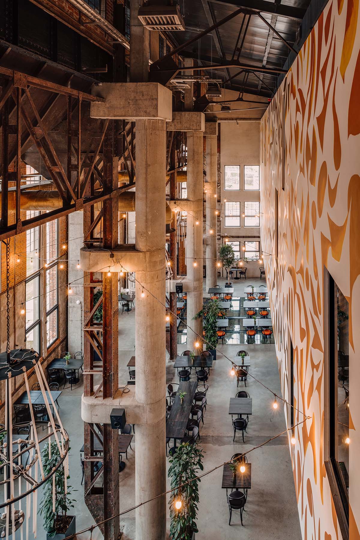 Bulak Projekt transforms former sugar factory into hotel complex with industrial look in Poland  