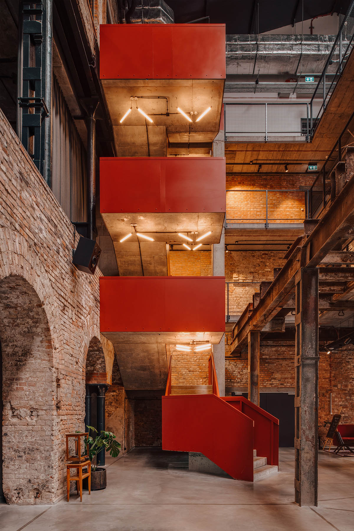 Bulak Projekt transforms former sugar factory into hotel complex with industrial look in Poland  