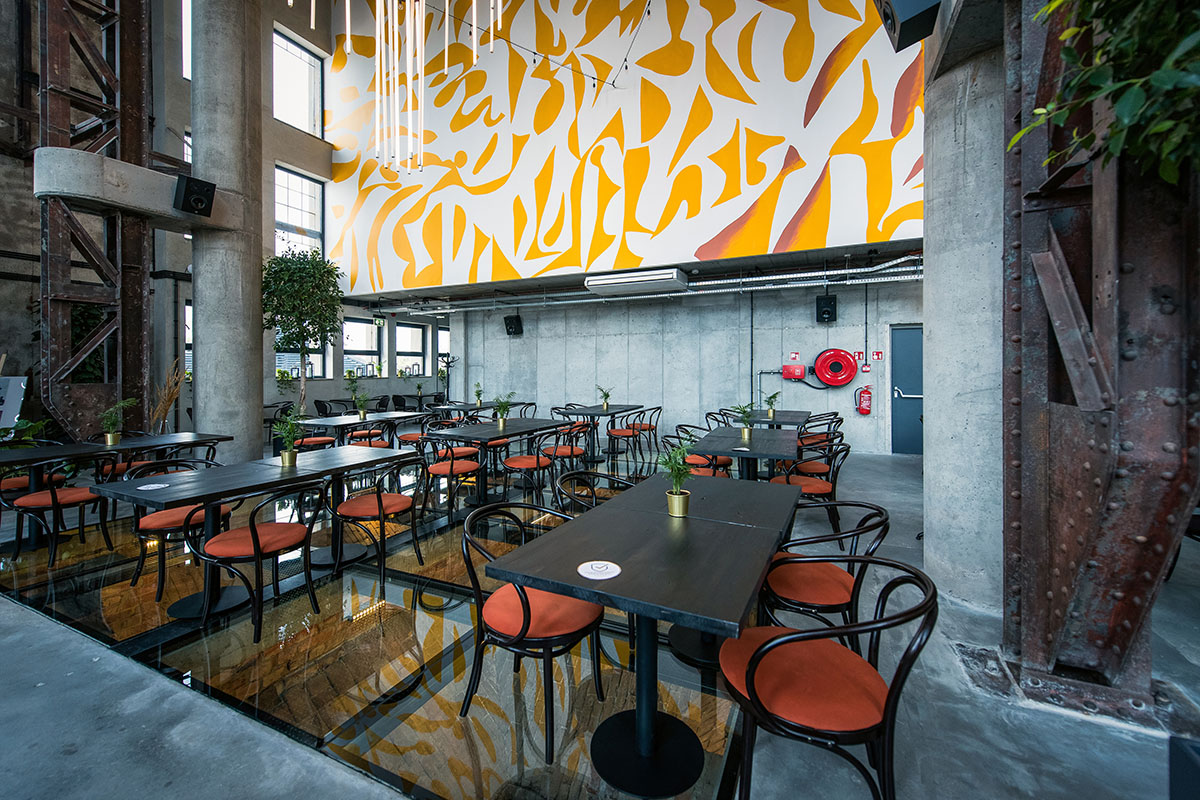 Bulak Projekt transforms former sugar factory into hotel complex with industrial look in Poland  