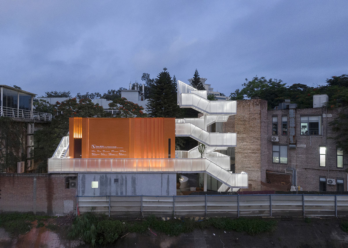 Wutopia Lab completes orange-colored vertical micro social complex with light tower in Guangzhou