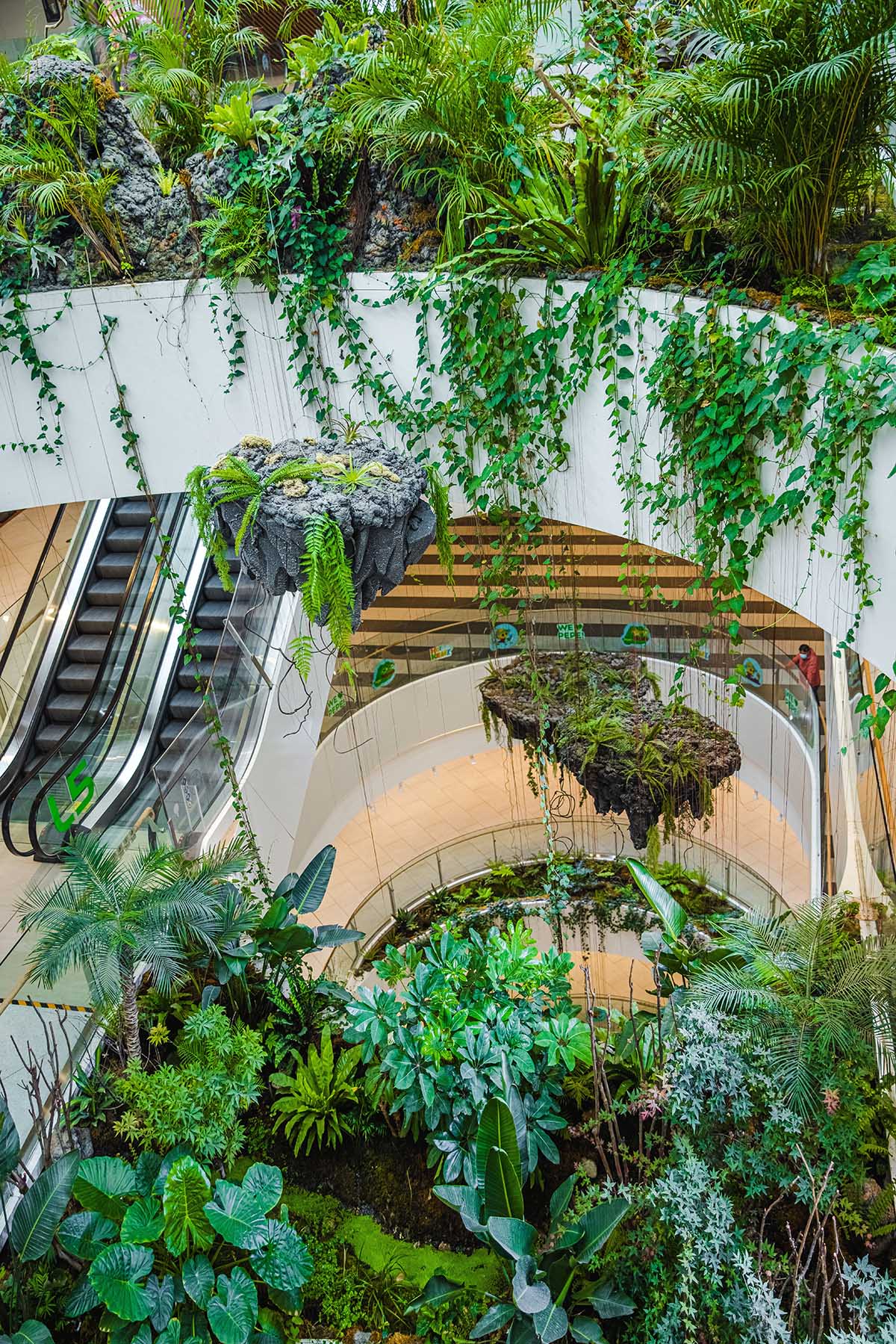 Green vertical interior design of Emquartier shopping mall dining