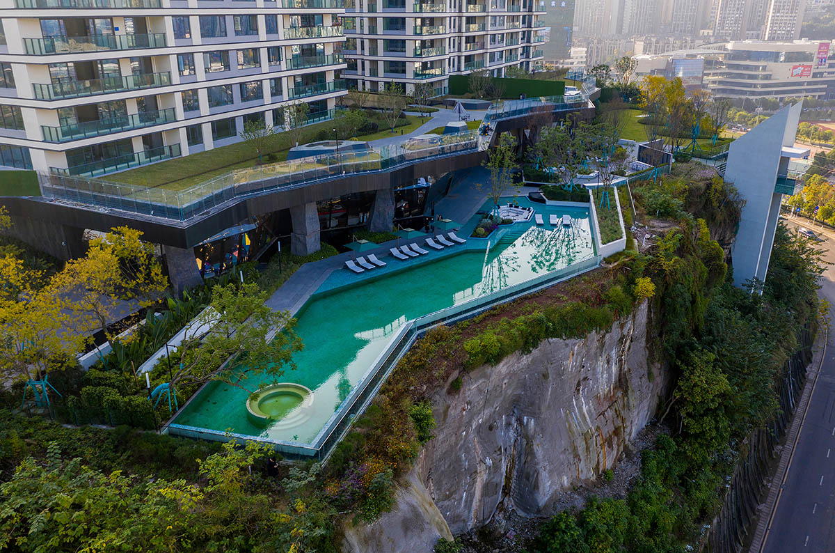 aoe completes reception center with glass polyhedron with observation tower on the edge of cliff