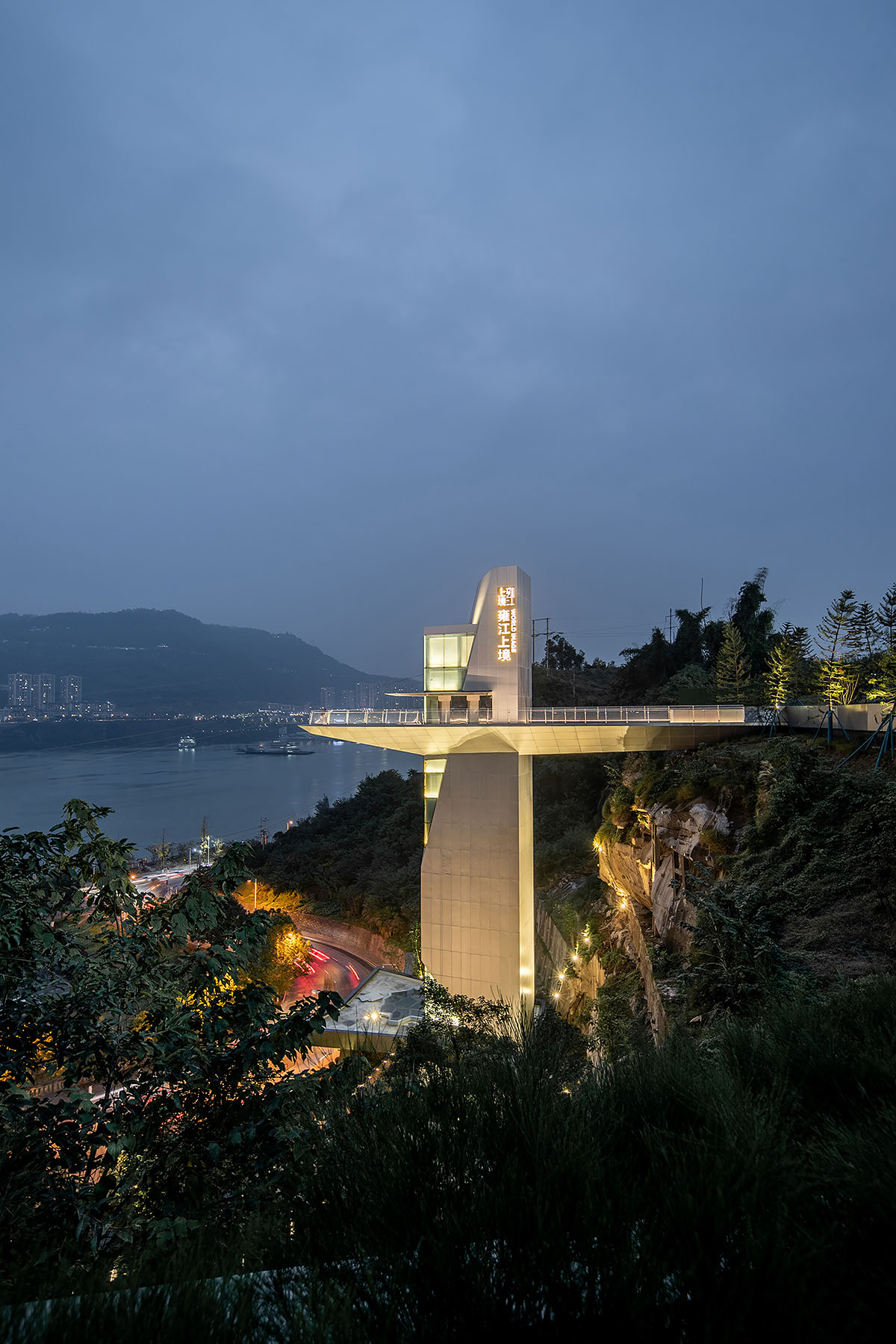 aoe completes reception center with glass polyhedron with observation tower on the edge of cliff