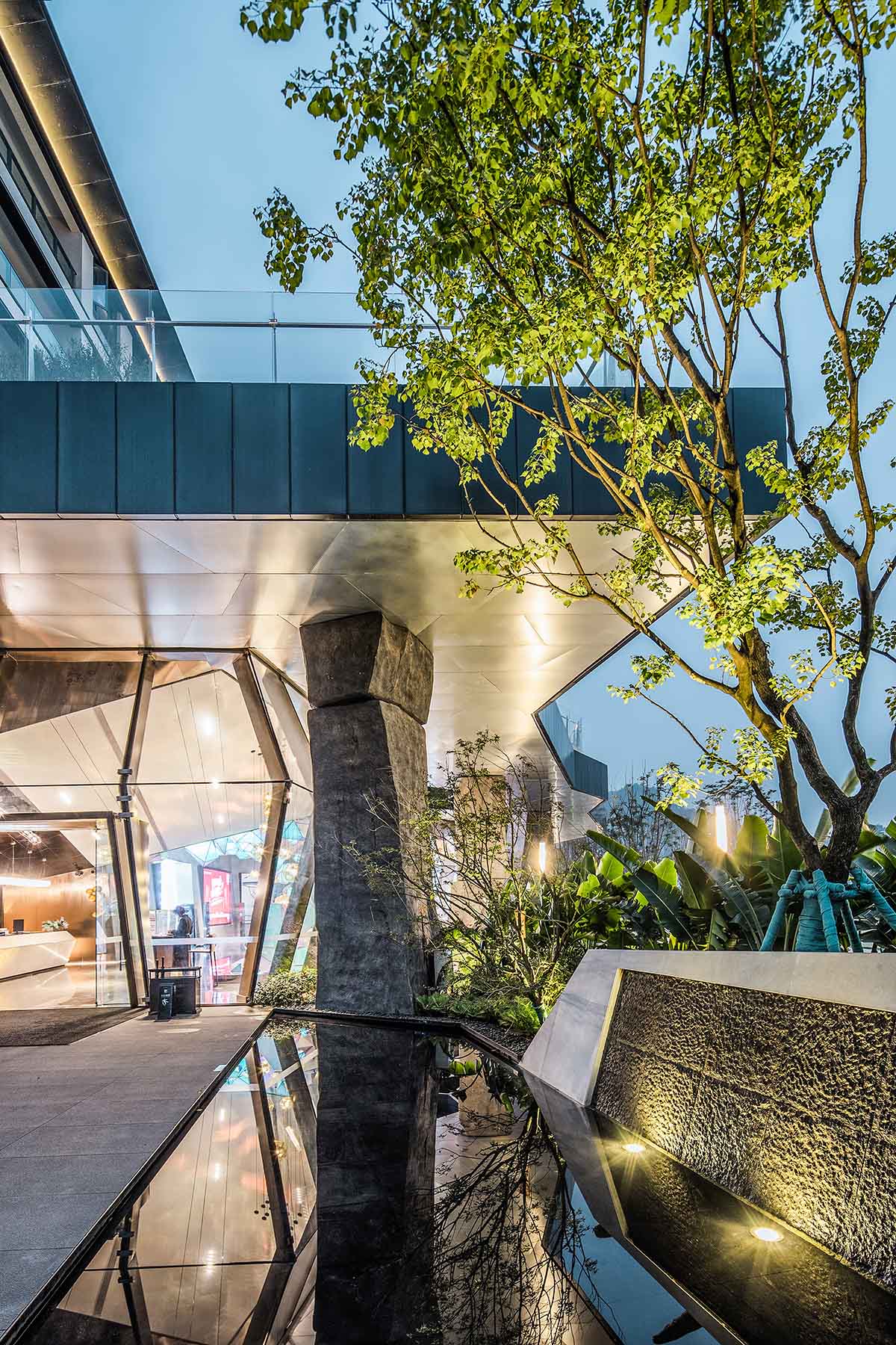 aoe completes reception center with glass polyhedron with observation tower on the edge of cliff
