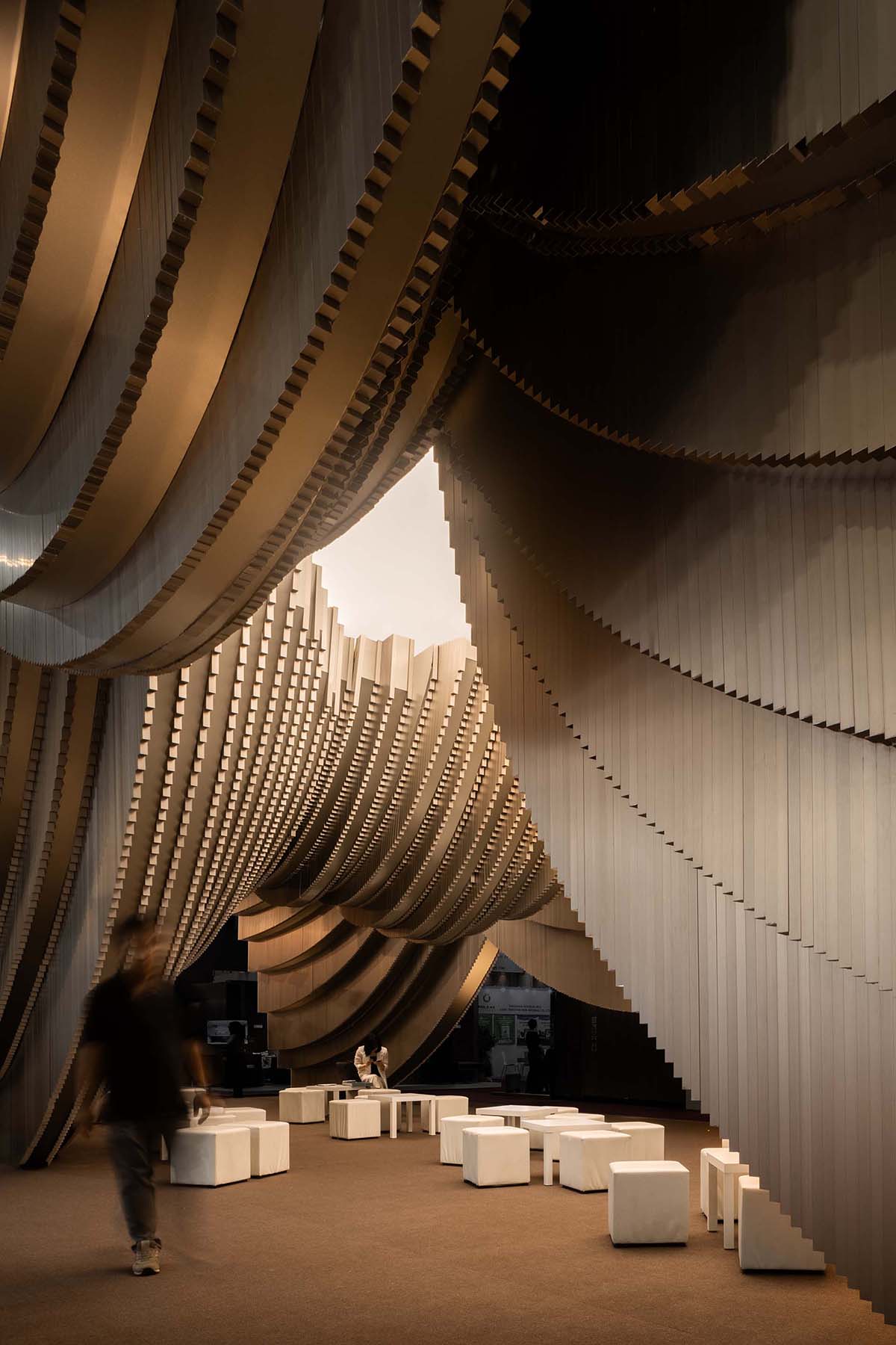 HAS design and research creates public ground interior from disc-like aluminum rods in Bangkok