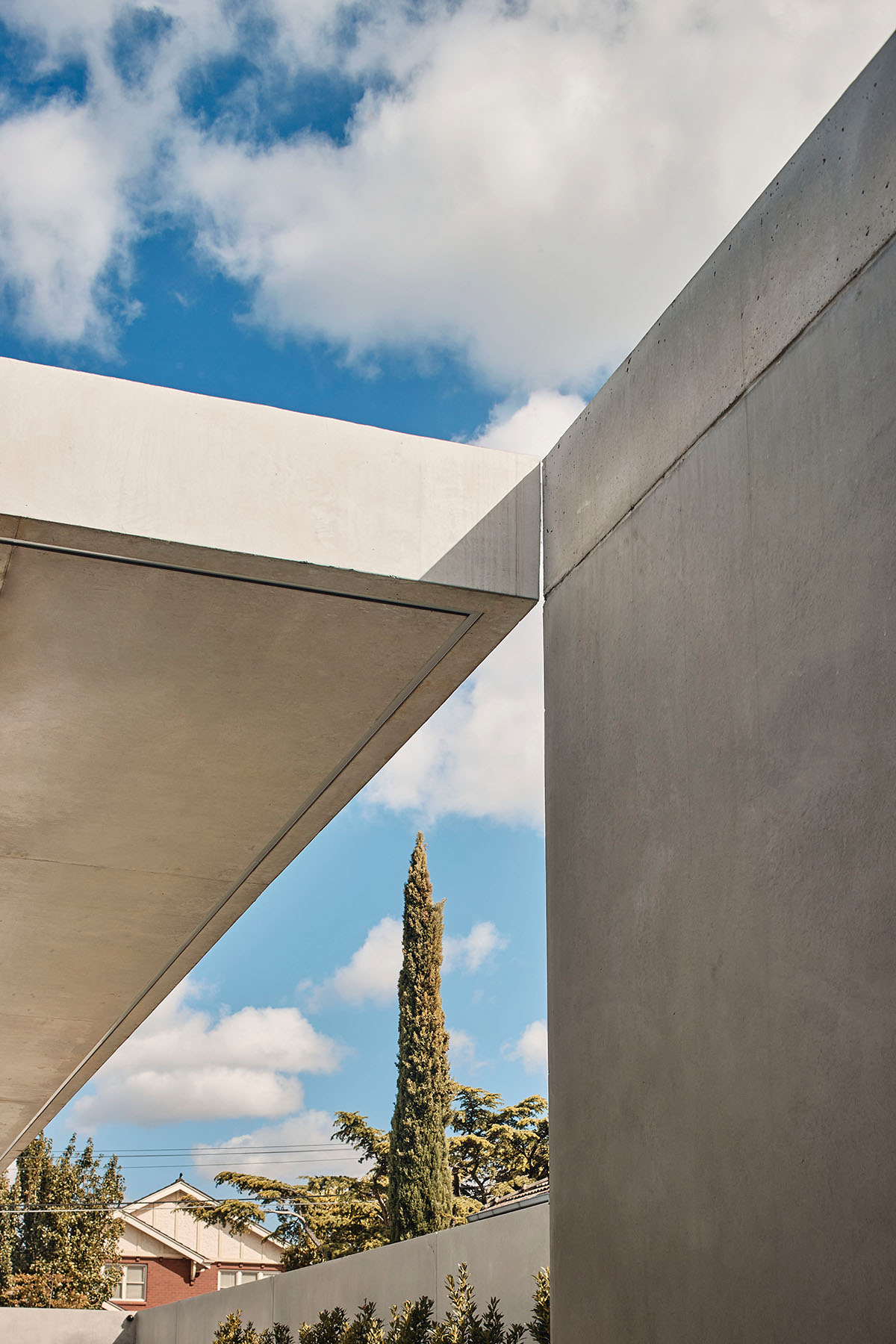 Courtyard Residence features layers of walls that heighten the sense of intrigue in Melbourne