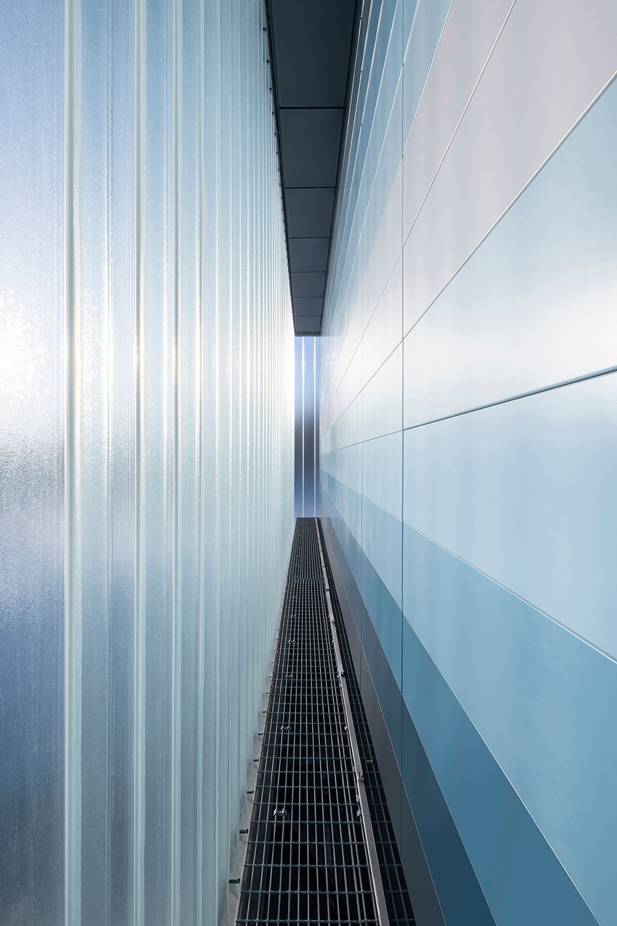 Smith Vigeant architectes designs water intake building clad in glass cube and shimmering pixels