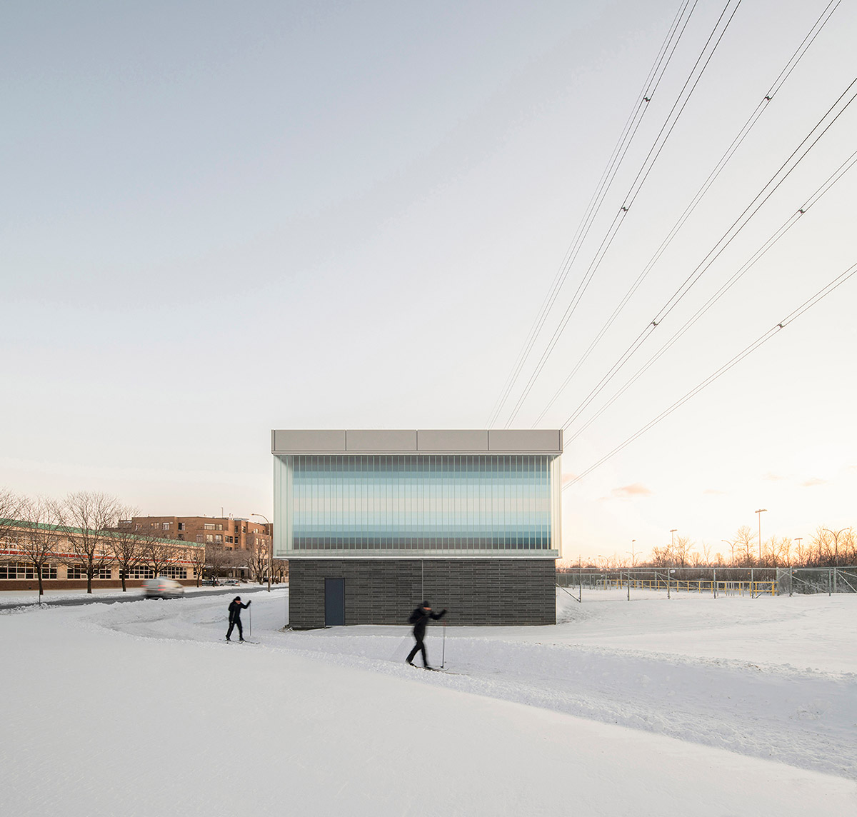Smith Vigeant architectes designs water intake building clad in glass cube and shimmering pixels