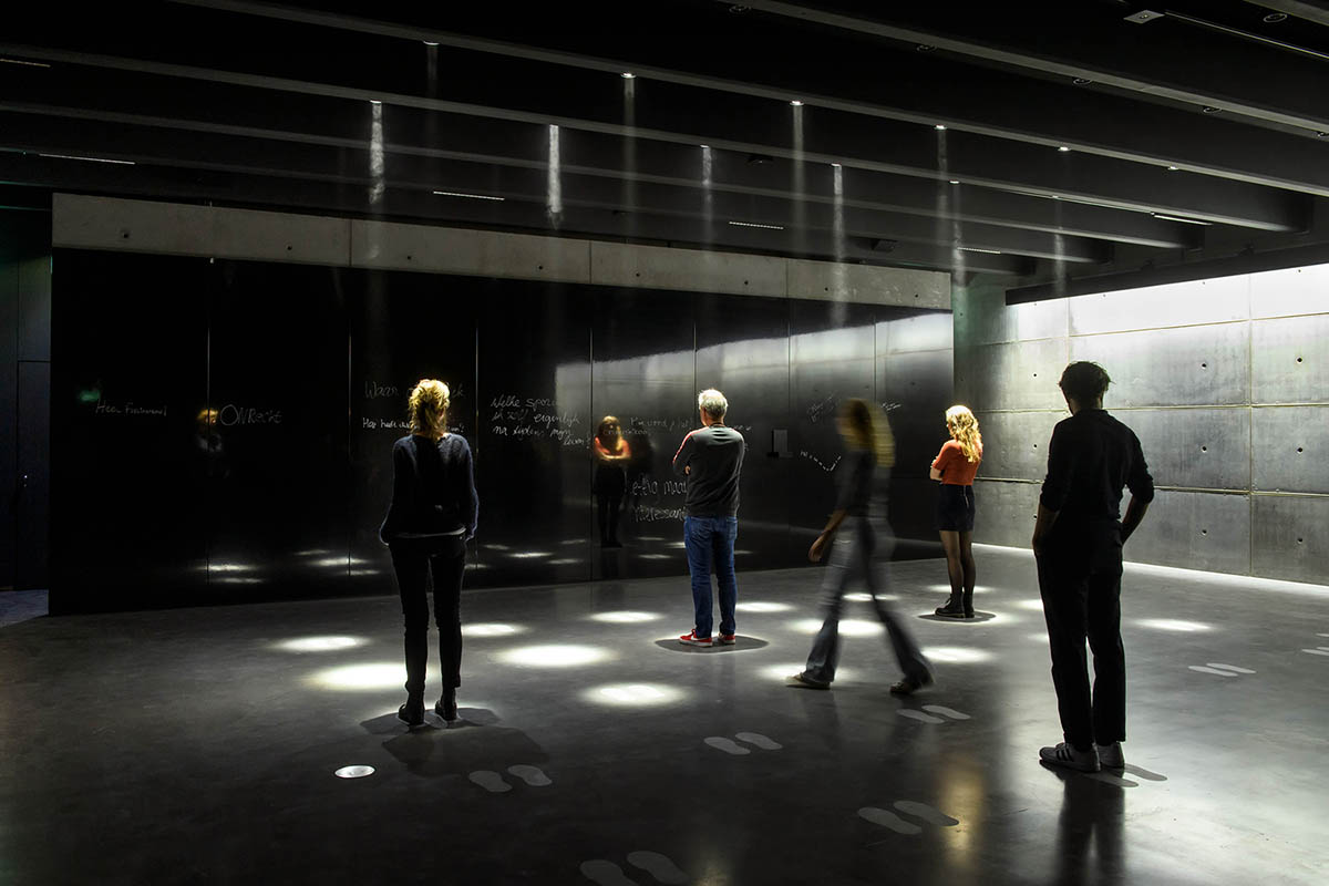 Inbo BV redesigns historic prisoner camp site with reflective pavilion and underground museum