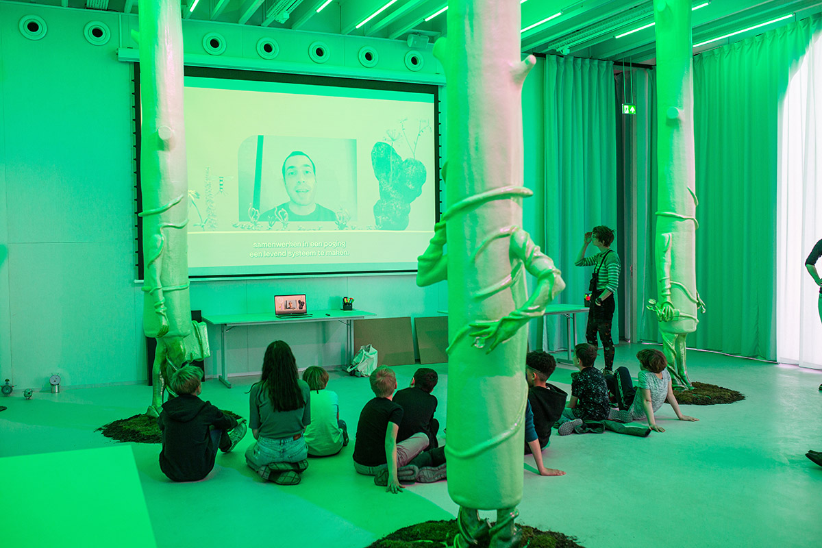 Studio Ossidiana combines three tangential rings to create pinkish floating art pavilion in Almere