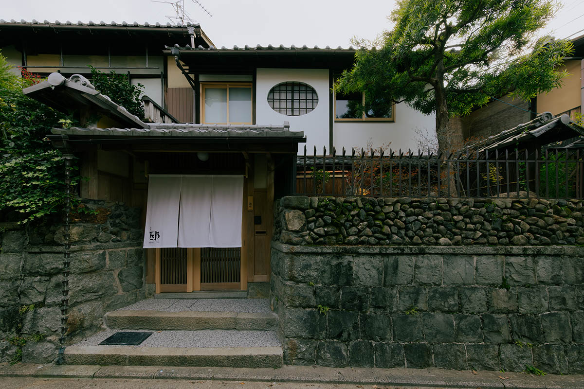 kooo architects creates a wooden interior sanctuary for contemporary accommodation in Kyoto City
