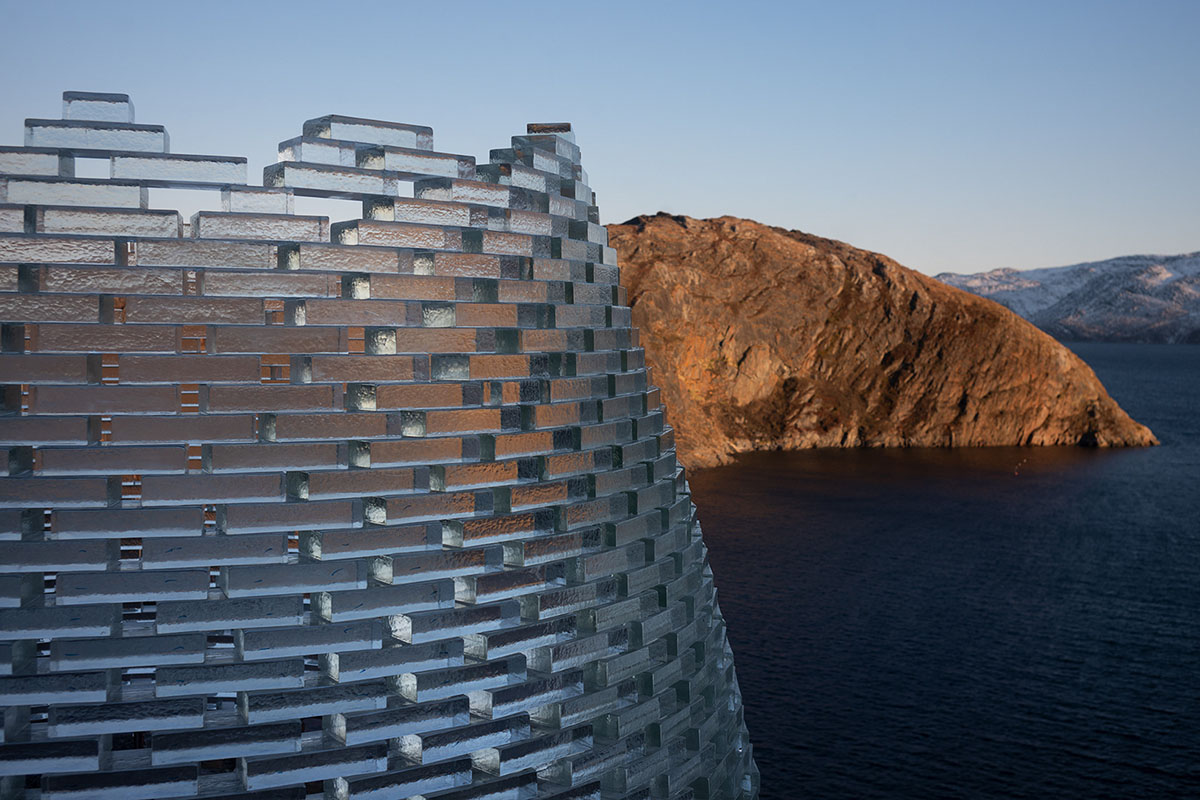 Circular Qaammat Pavilion is made of glass blocks to activate snow reflections in Greenland