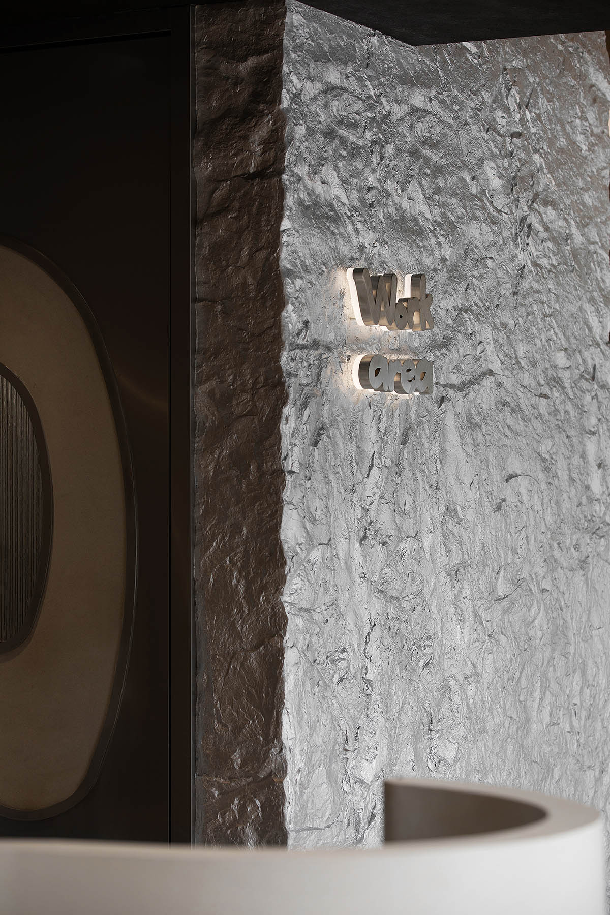 OYTT Design creates interiors featuring irregular-shaped caves and curved walls for a shop in China 