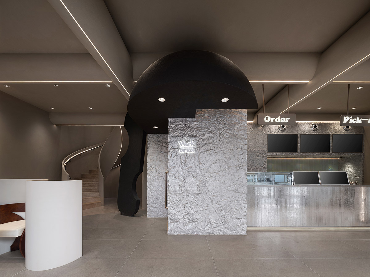 OYTT Design creates interiors featuring irregular-shaped caves and curved walls for a shop in China 