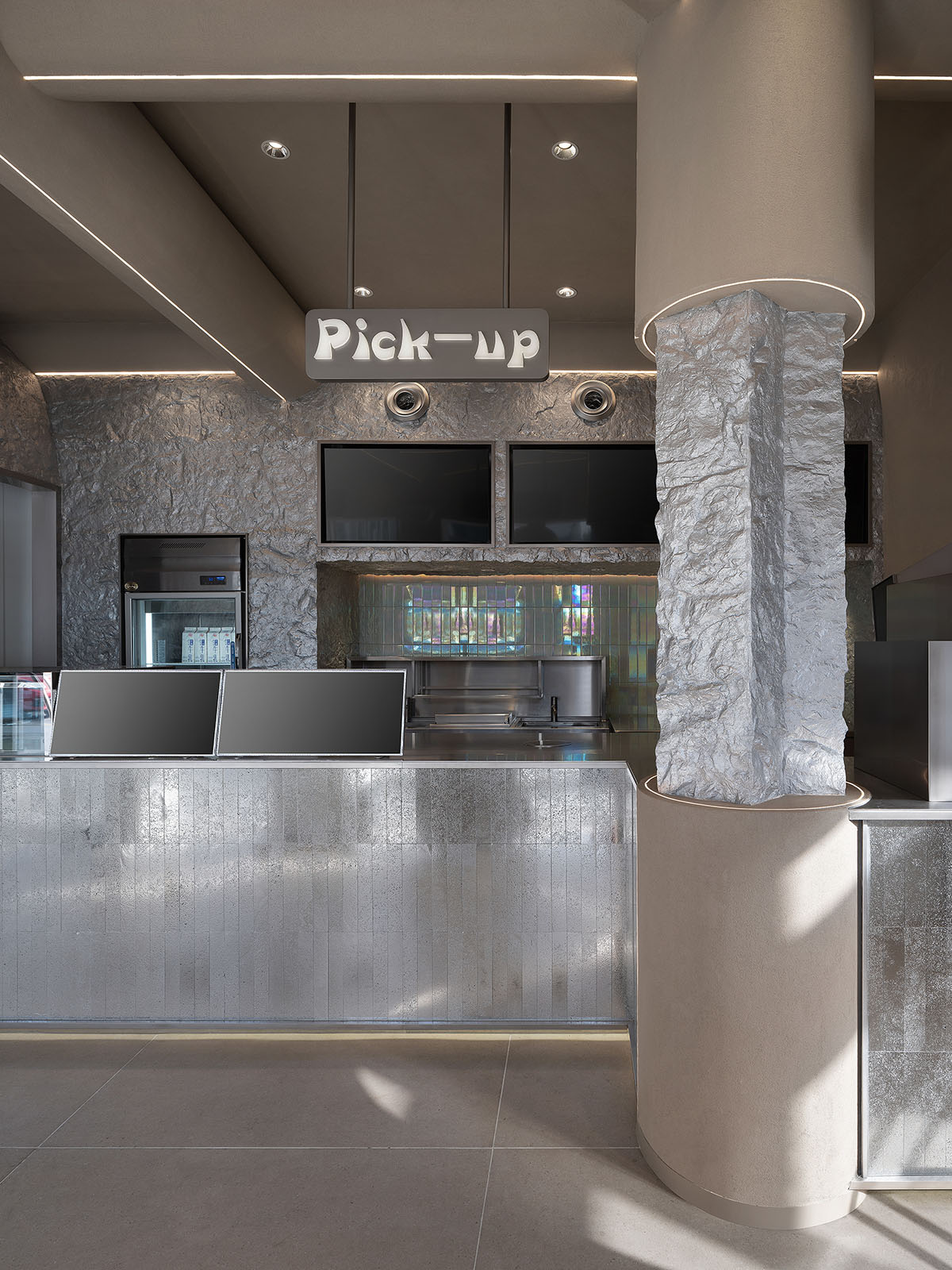 OYTT Design creates interiors featuring irregular-shaped caves and curved walls for a shop in China 