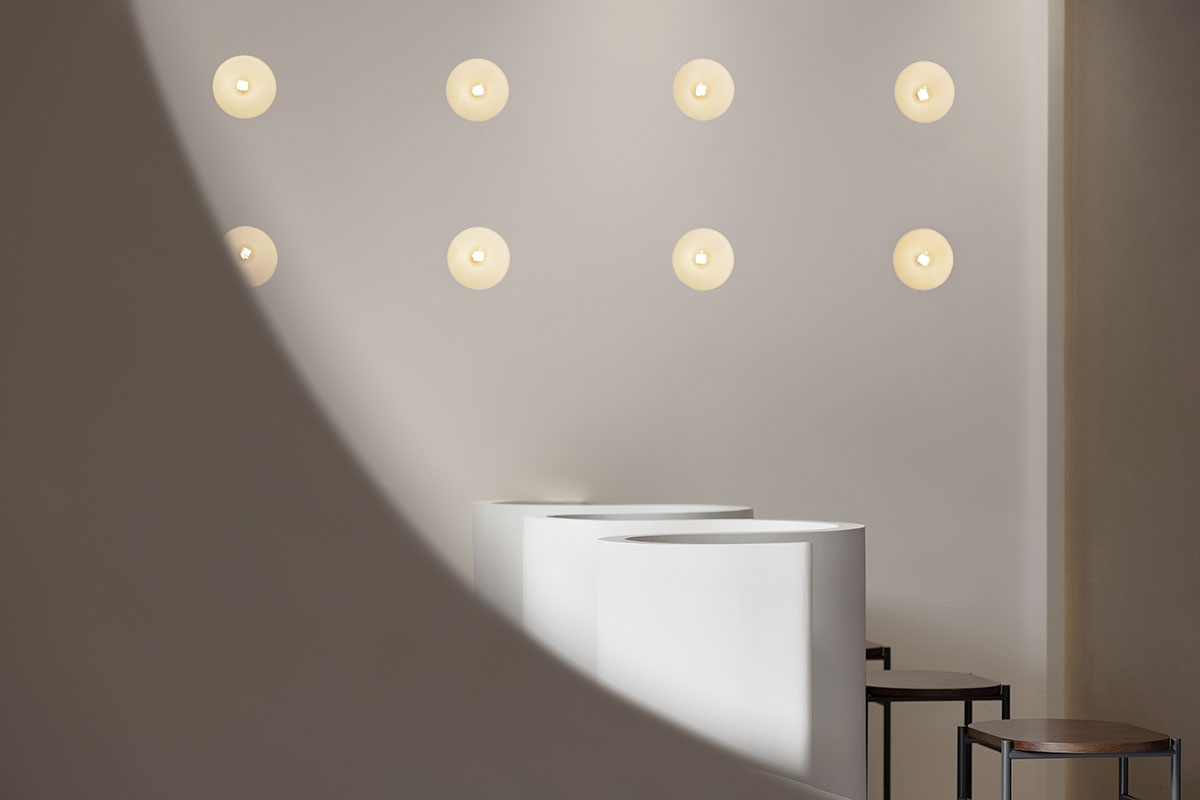 OYTT Design creates interiors featuring irregular-shaped caves and curved walls for a shop in China 