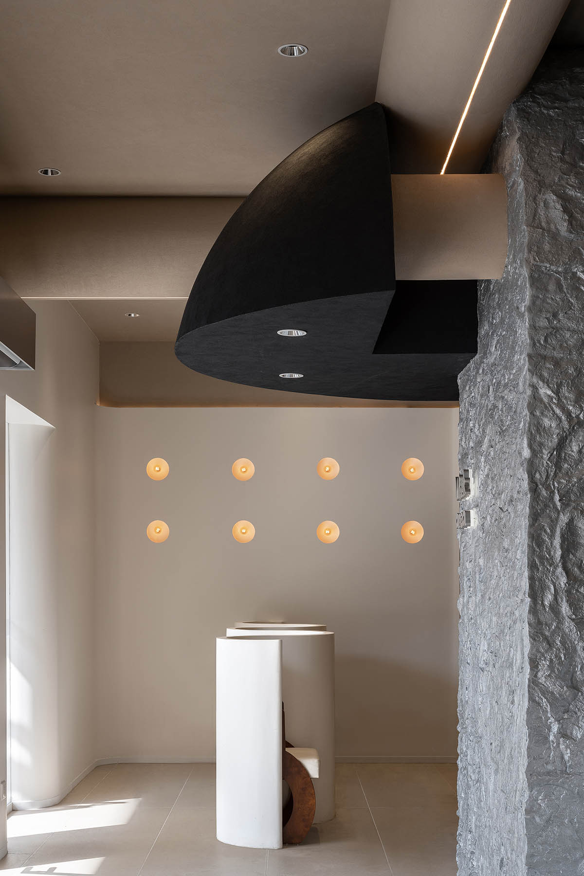 OYTT Design creates interiors featuring irregular-shaped caves and curved walls for a shop in China 