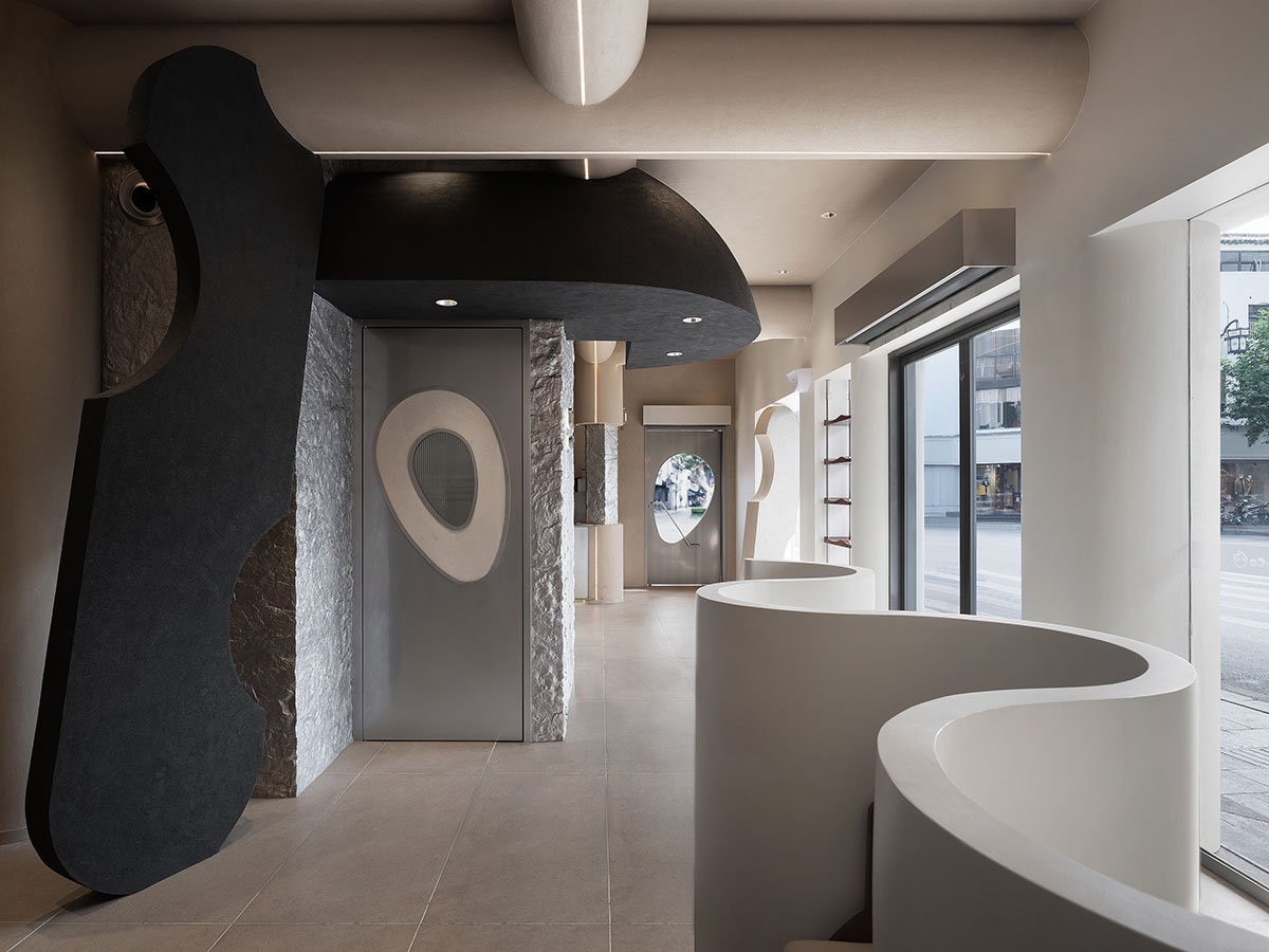 OYTT Design creates interiors featuring irregular-shaped caves and curved walls for a shop in China 