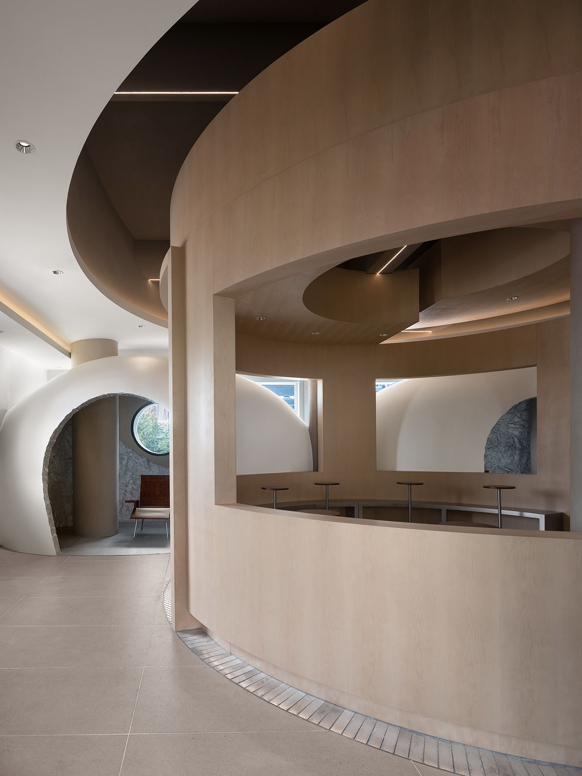 OYTT Design creates interiors featuring irregular-shaped caves and curved walls for a shop in China 