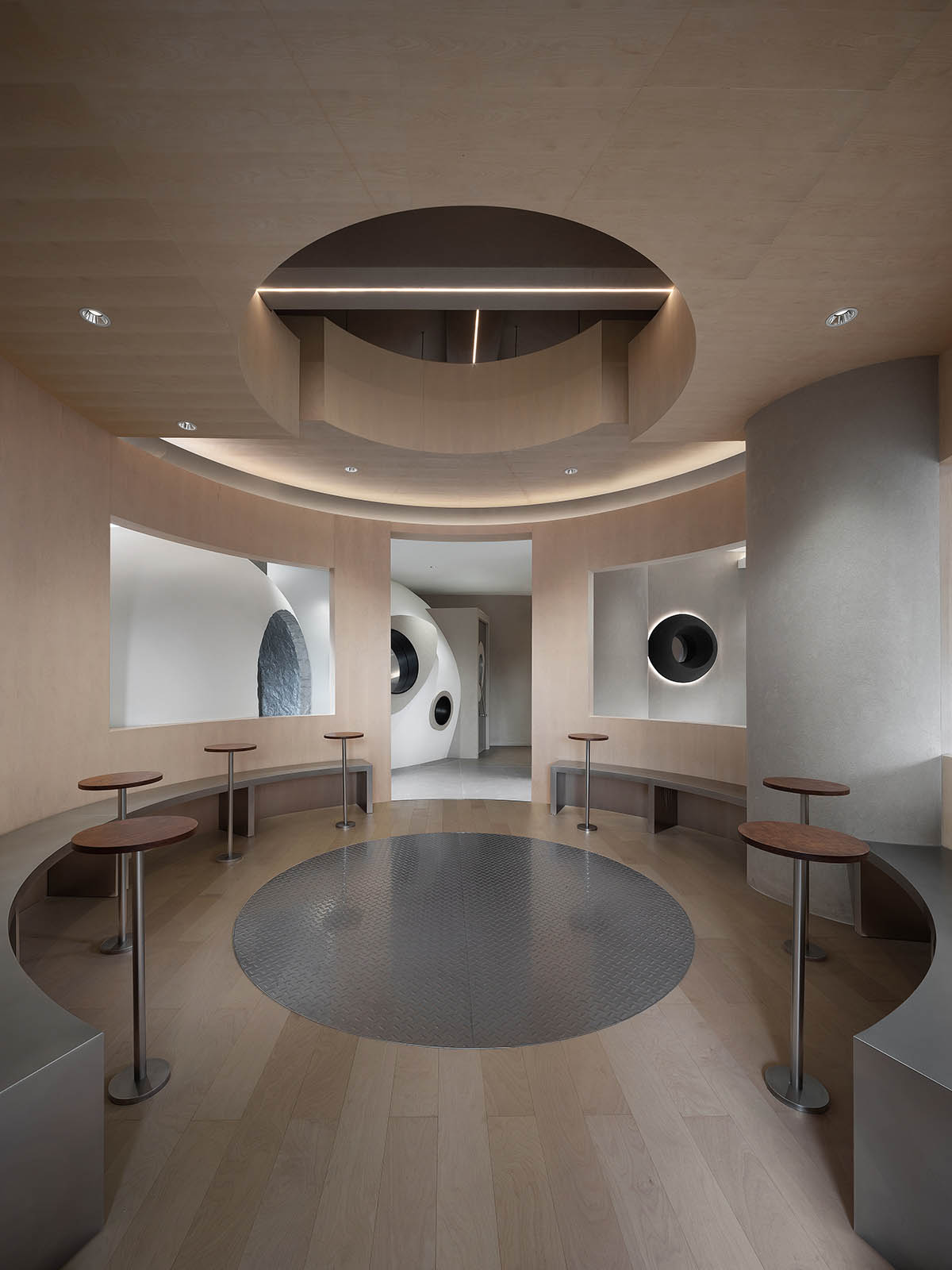OYTT Design creates interiors featuring irregular-shaped caves and curved walls for a shop in China 