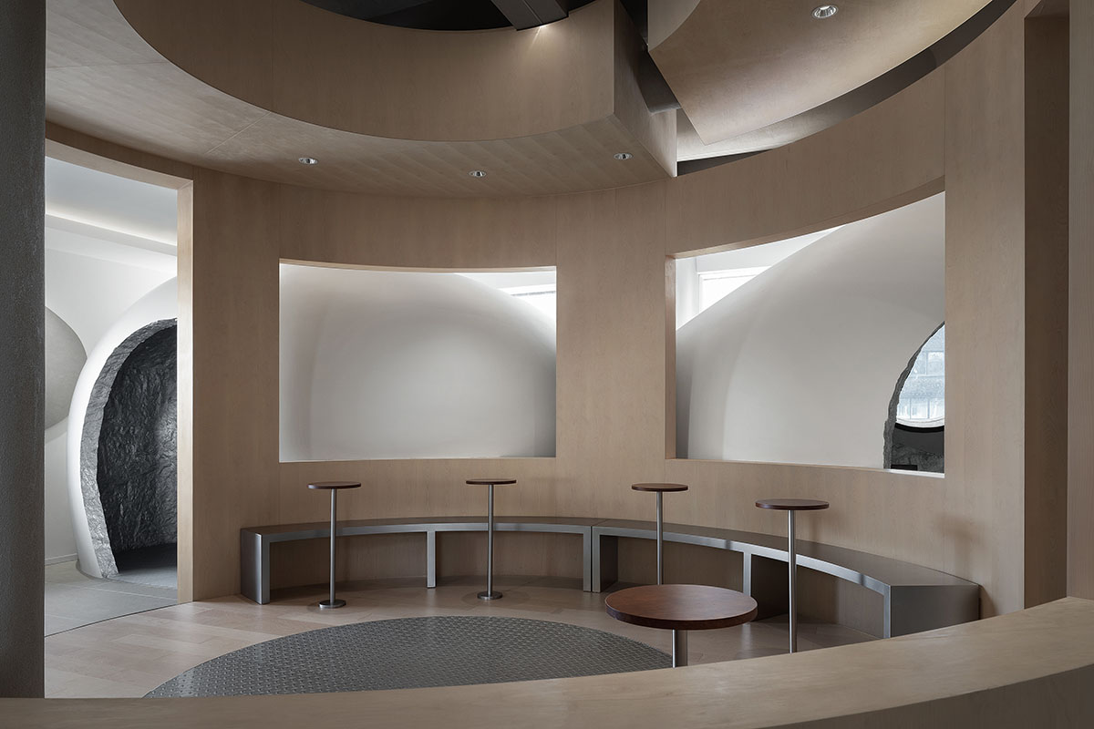 OYTT Design creates interiors featuring irregular-shaped caves and curved walls for a shop in China 