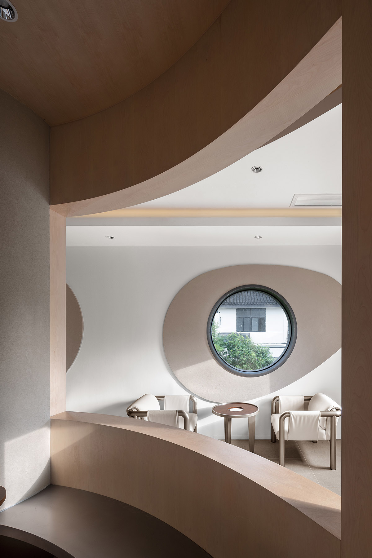 OYTT Design creates interiors featuring irregular-shaped caves and curved walls for a shop in China 