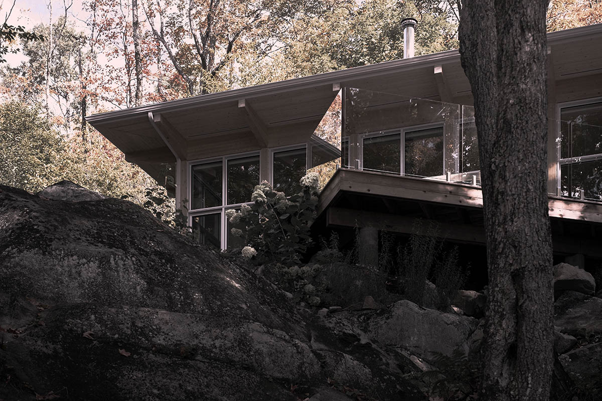Alain Carle Architecte completes Rolo House on rocky mountains to observe landscape in Quebec