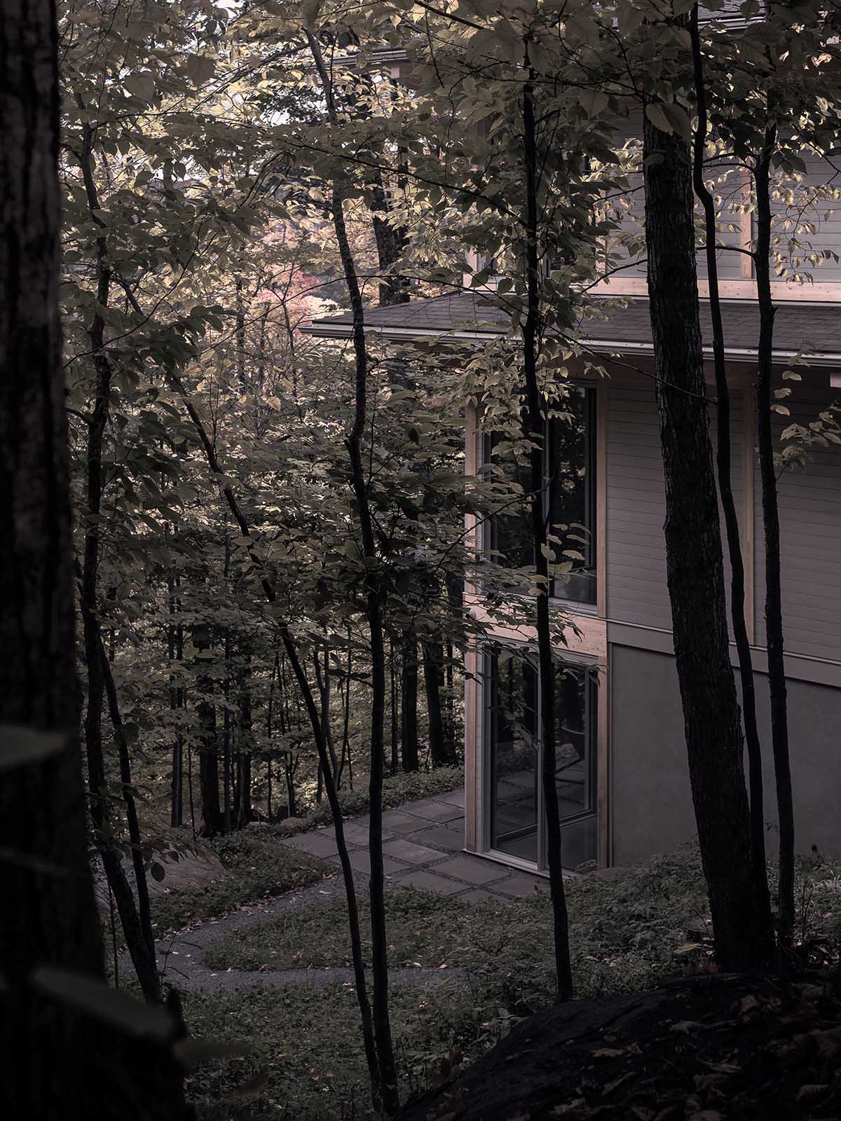 Alain Carle Architecte completes Rolo House on rocky mountains to observe landscape in Quebec