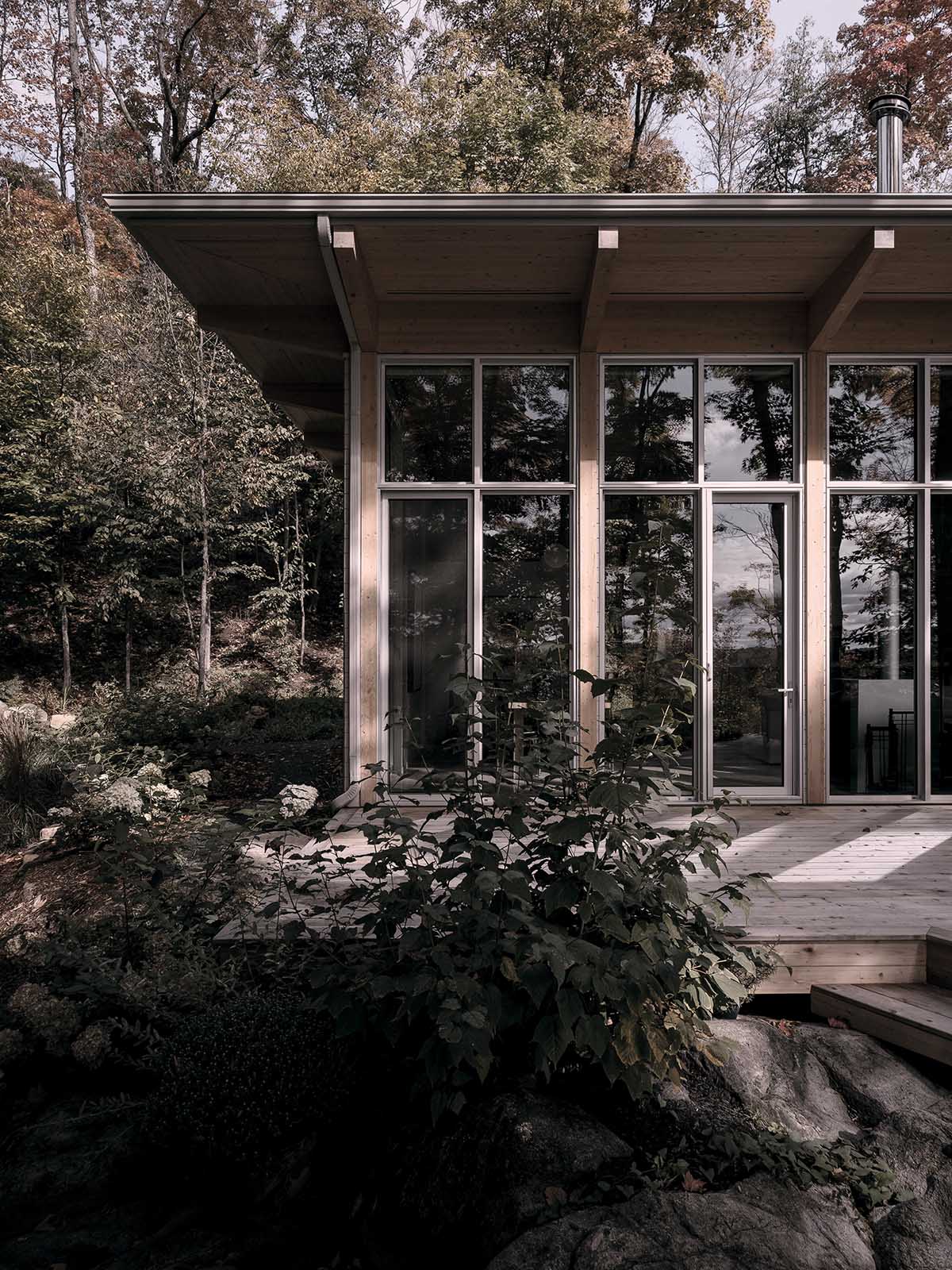 Alain Carle Architecte completes Rolo House on rocky mountains to observe landscape in Quebec