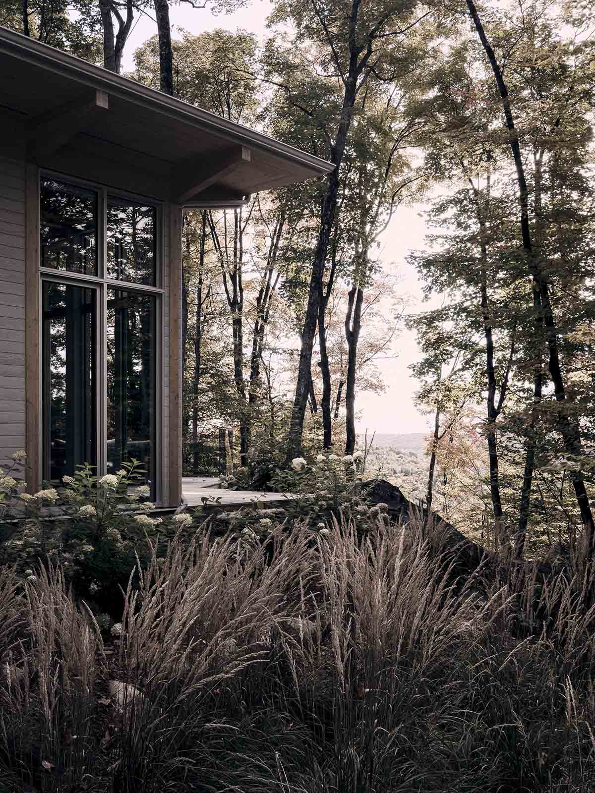 Alain Carle Architecte completes Rolo House on rocky mountains to observe landscape in Quebec