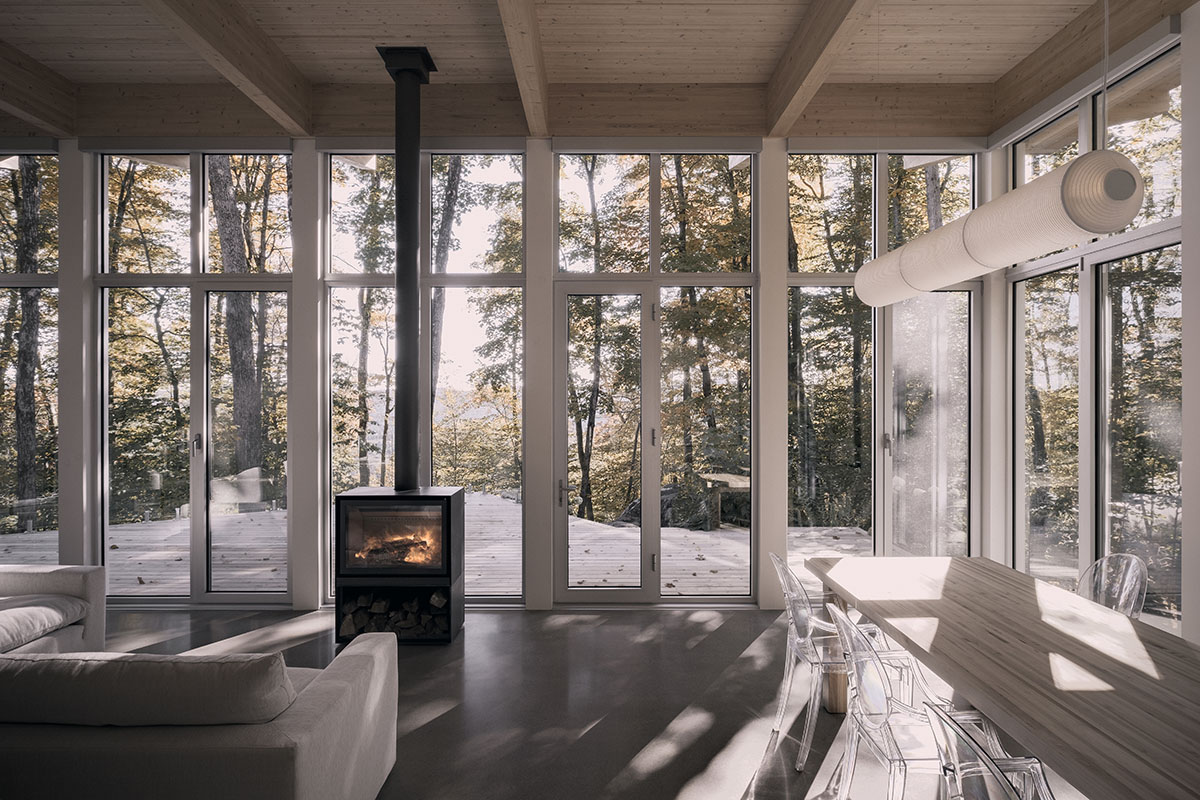 Alain Carle Architecte completes Rolo House on rocky mountains to observe landscape in Quebec