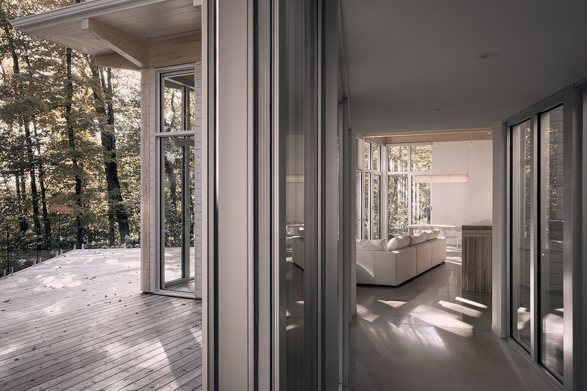 Alain Carle Architecte completes Rolo House on rocky mountains to observe landscape in Quebec