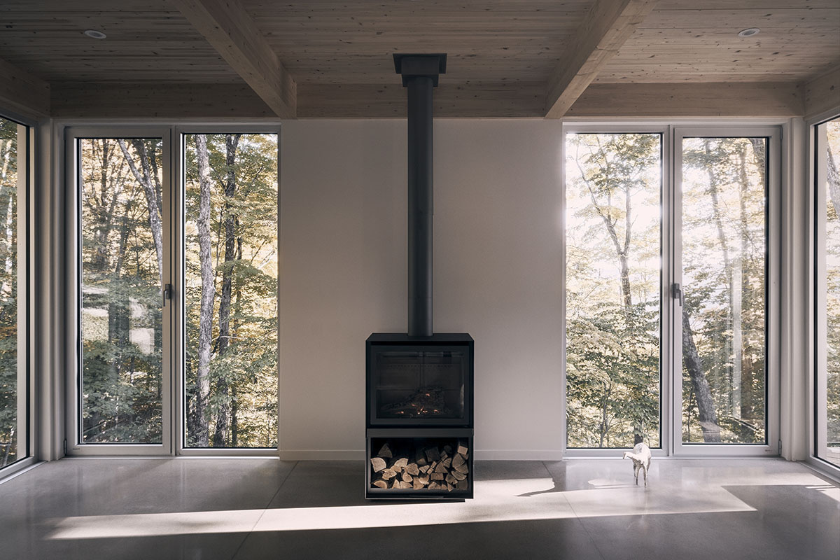 Alain Carle Architecte completes Rolo House on rocky mountains to observe landscape in Quebec