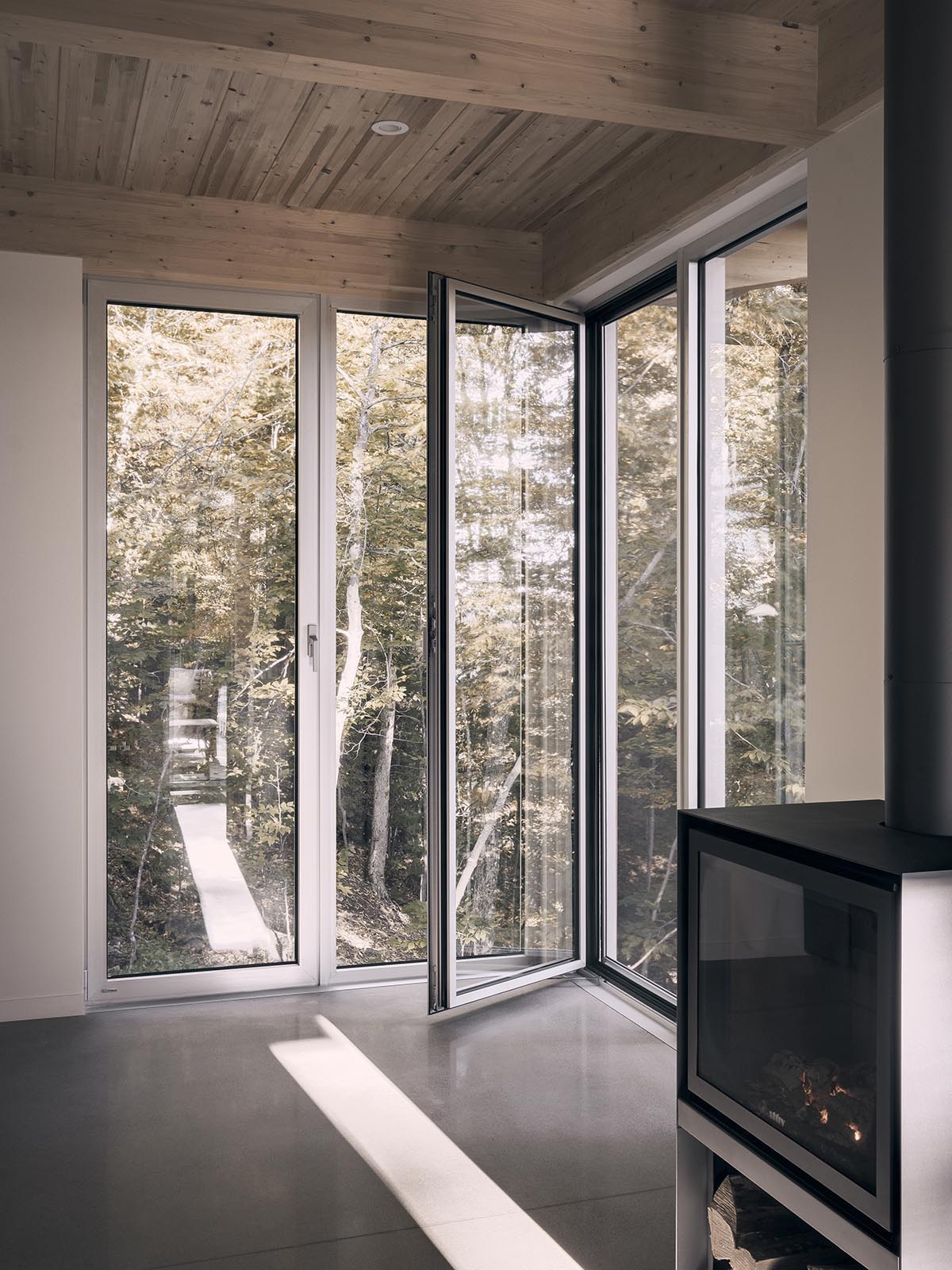 Alain Carle Architecte completes Rolo House on rocky mountains to observe landscape in Quebec