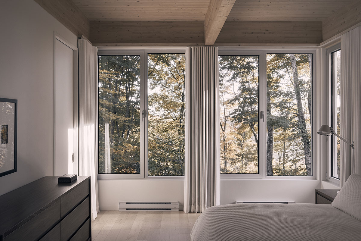 Alain Carle Architecte completes Rolo House on rocky mountains to observe landscape in Quebec