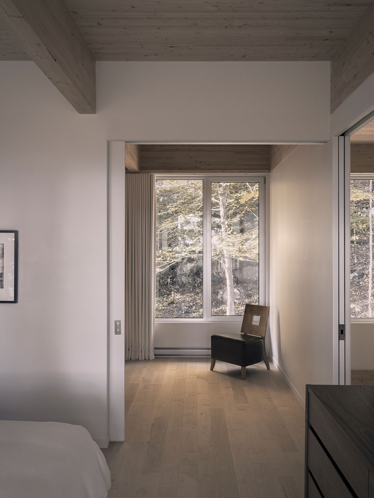 Alain Carle Architecte completes Rolo House on rocky mountains to observe landscape in Quebec