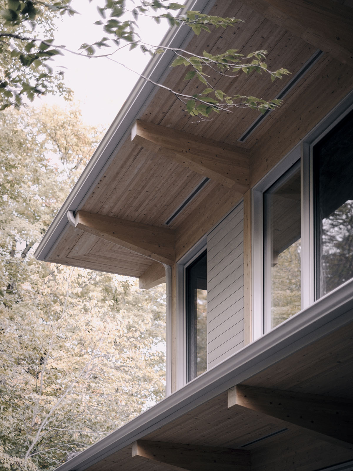 Alain Carle Architecte completes Rolo House on rocky mountains to observe landscape in Quebec