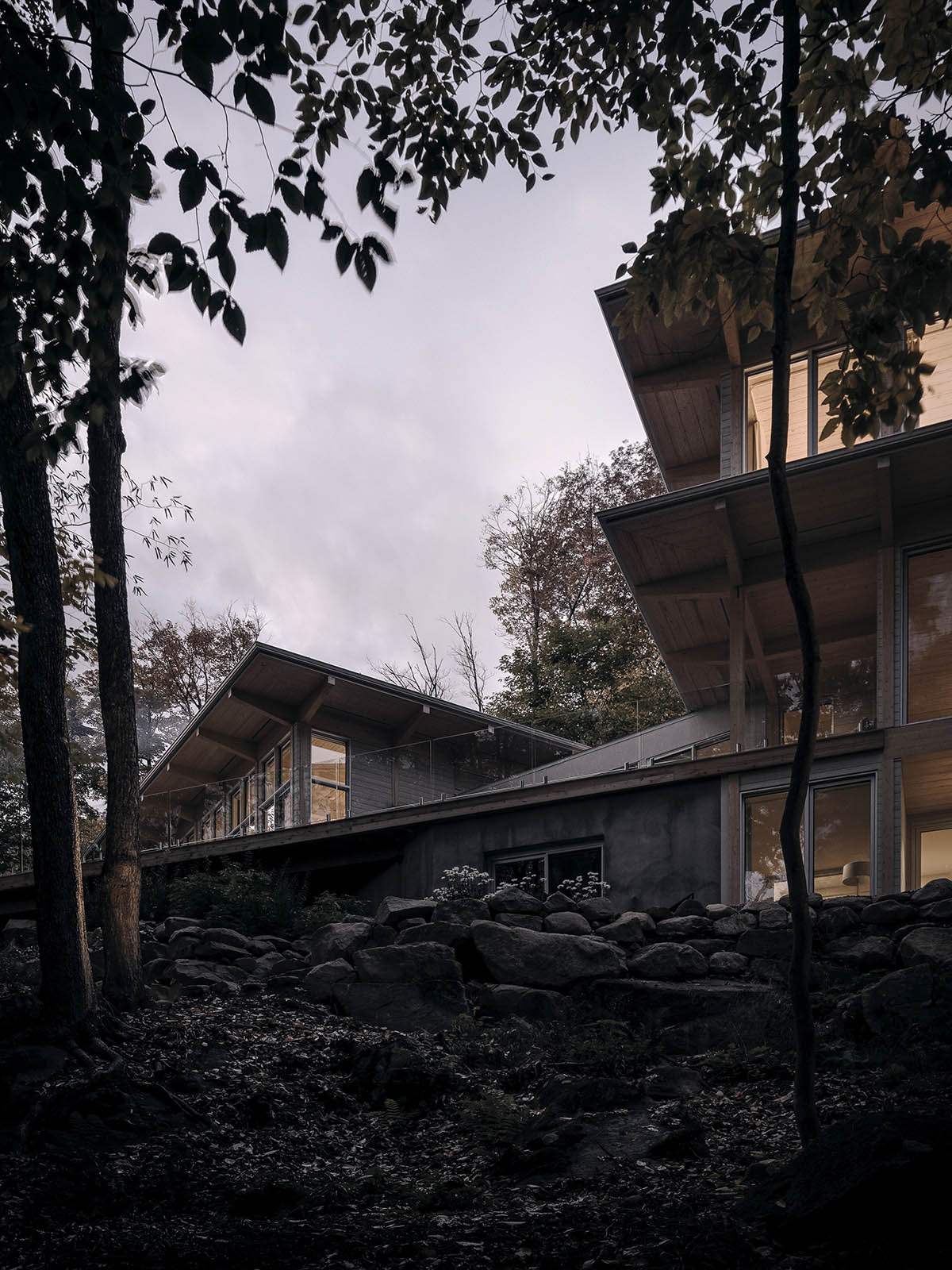 Alain Carle Architecte completes Rolo House on rocky mountains to observe landscape in Quebec