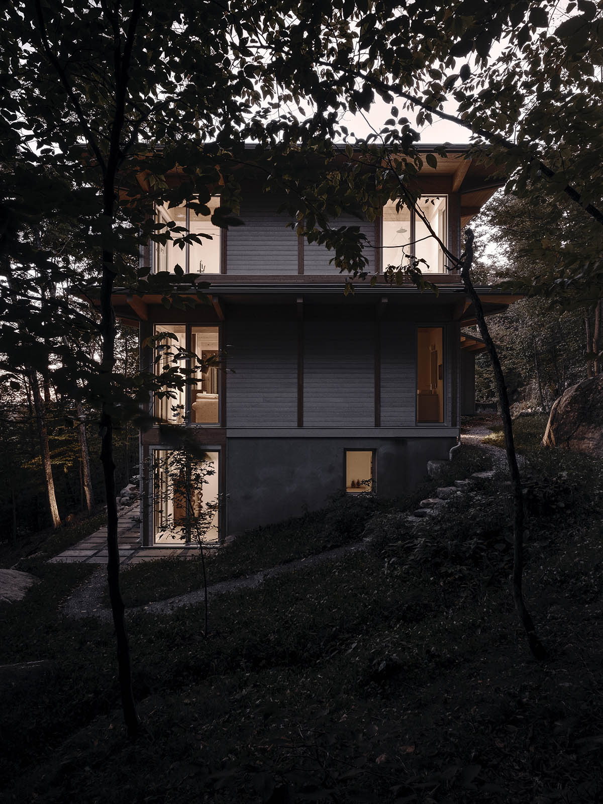 Alain Carle Architecte completes Rolo House on rocky mountains to observe landscape in Quebec