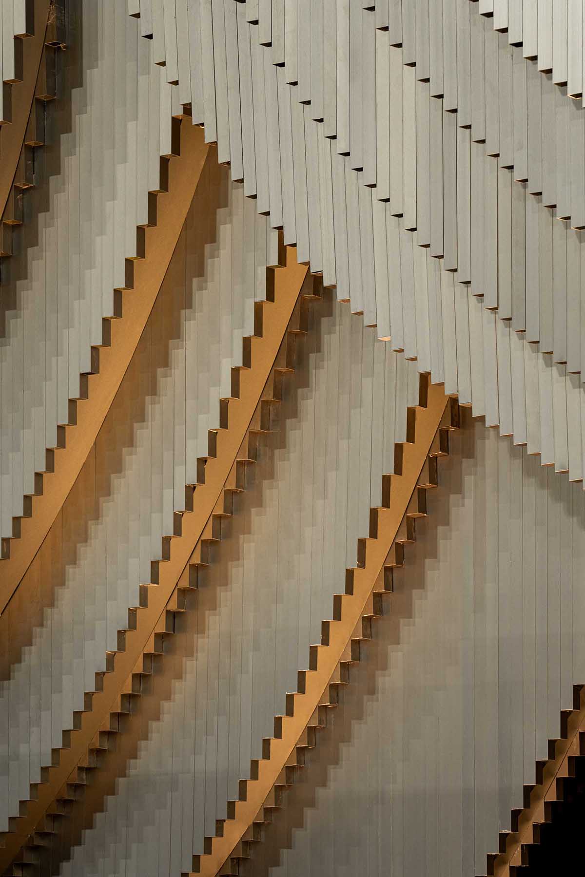 HAS design and research creates public ground interior from disc-like aluminum rods in Bangkok